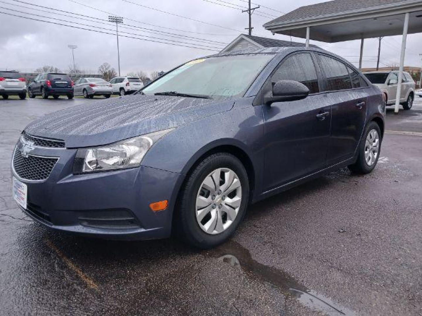 2013 Atlantis Blue Metallic Chevrolet Cruze LS Auto (1G1PA5SG9D7) with an 1.8L L4 DOHC 16V engine, 6-Speed Automatic transmission, located at 880 E. National Road, Vandalia, OH, 45377, (937) 908-9800, 39.892189, -84.181015 - Photo#2