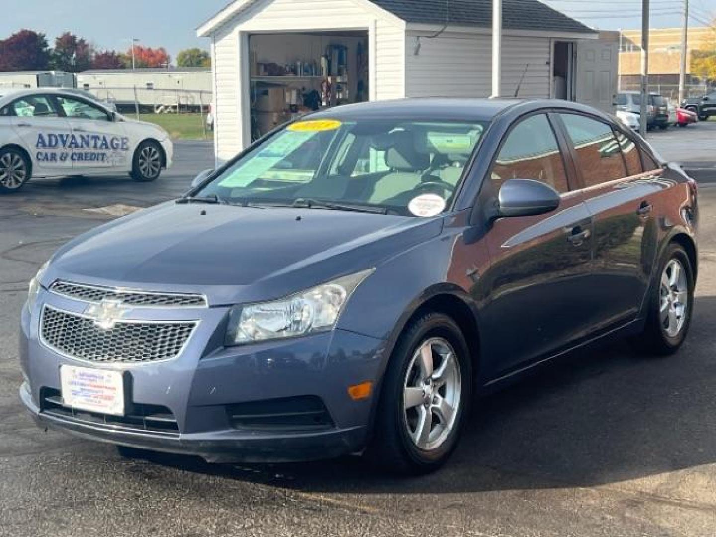 2013 Blue Topaz Metallic Chevrolet Cruze 1LT Auto (1G1PC5SB1D7) with an 1.4L L4 DOHC 16V TURBO engine, 6-Speed Automatic transmission, located at 1230 East Main St, Xenia, OH, 45385, (937) 908-9800, 39.687321, -83.910294 - Photo#2