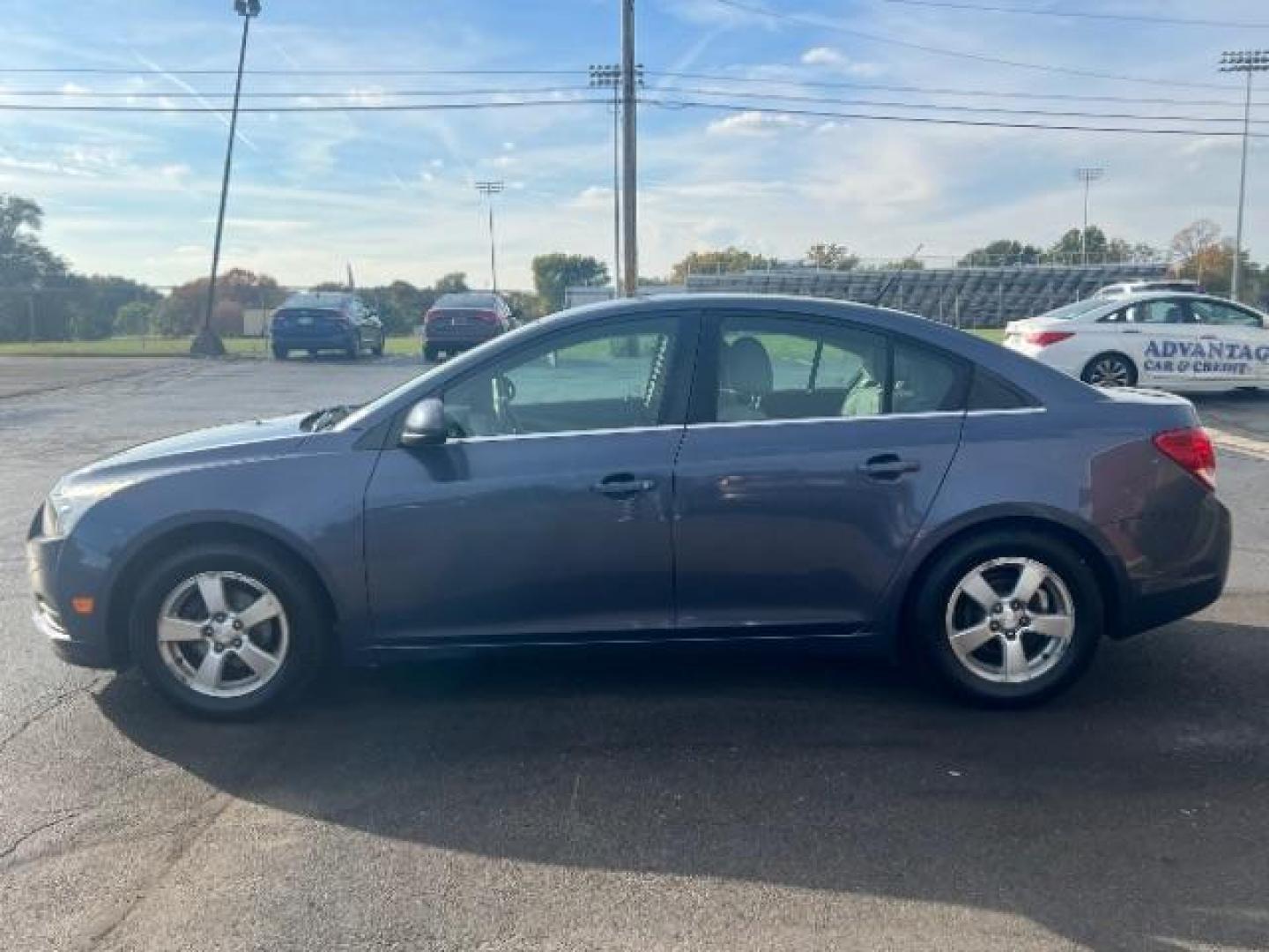 2013 Blue Topaz Metallic Chevrolet Cruze 1LT Auto (1G1PC5SB1D7) with an 1.4L L4 DOHC 16V TURBO engine, 6-Speed Automatic transmission, located at 1230 East Main St, Xenia, OH, 45385, (937) 908-9800, 39.687321, -83.910294 - Photo#3