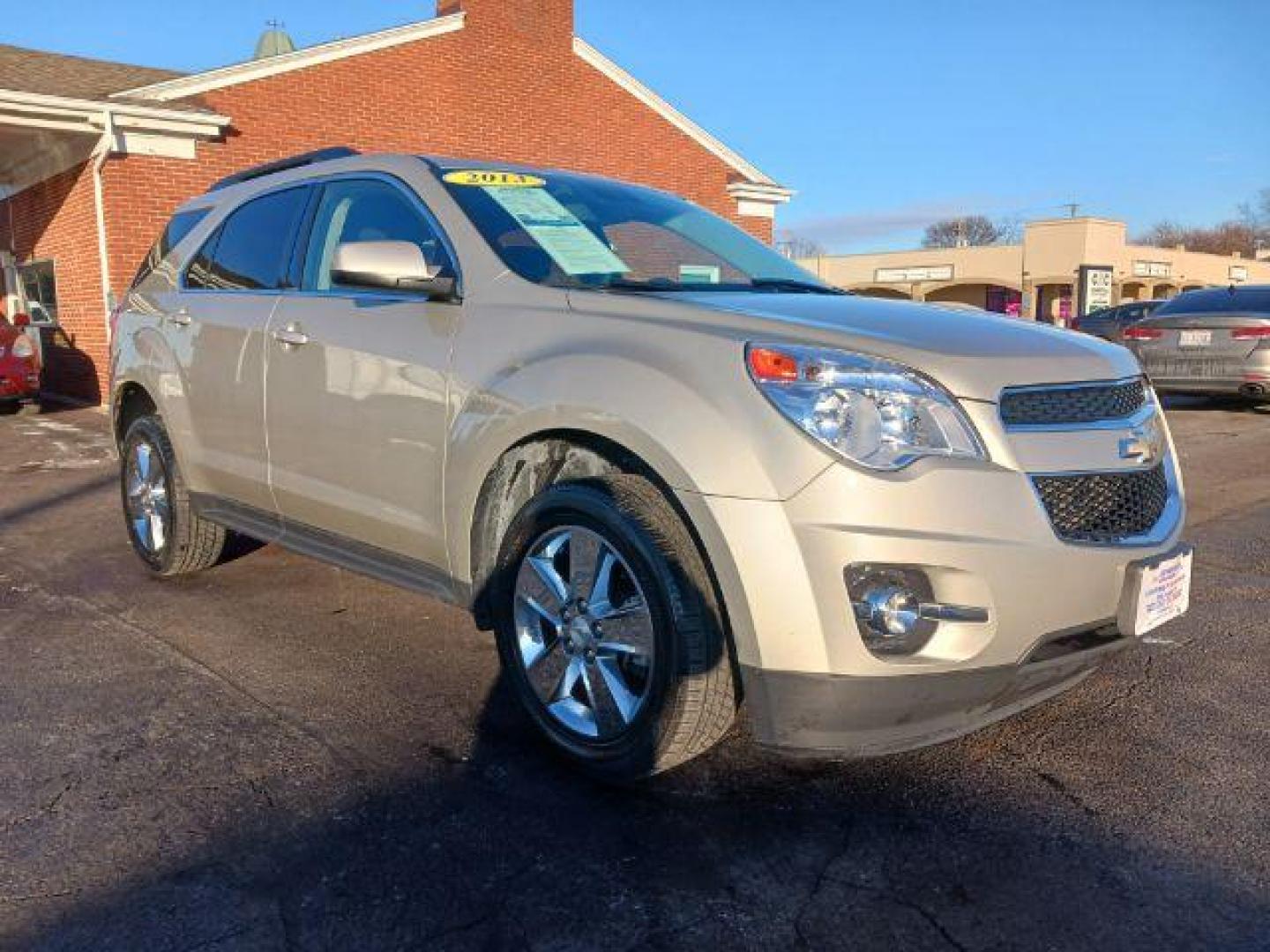 2013 Champagne Silver Metallic Chevrolet Equinox 1LT 2WD (2GNALDEK1D1) with an 2.4L L4 DOHC 16V engine, 6-Speed Automatic transmission, located at 401 Woodman Dr, Riverside, OH, 45431, (937) 908-9800, 39.763779, -84.122063 - Photo#0