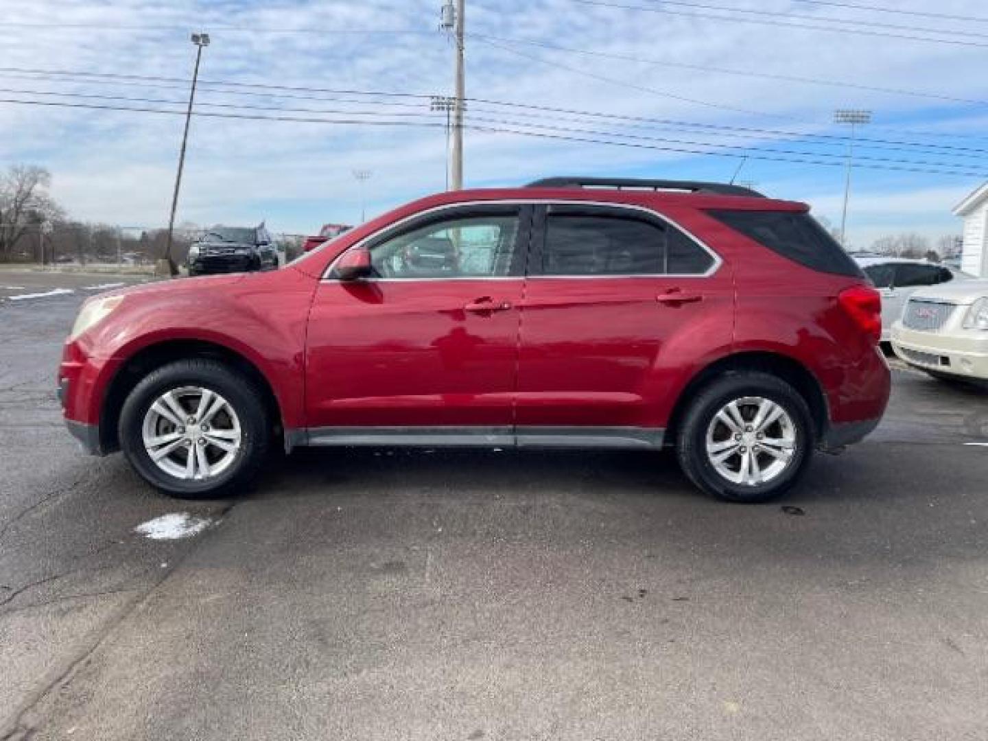 2013 Crystal Red Tintcoat Chevrolet Equinox 1LT AWD (2GNFLEEK4D6) with an 2.4L L4 DOHC 16V engine, 6-Speed Automatic transmission, located at 1951 S Dayton Lakeview Rd., New Carlisle, OH, 45344, (937) 908-9800, 39.890999, -84.050255 - Photo#1