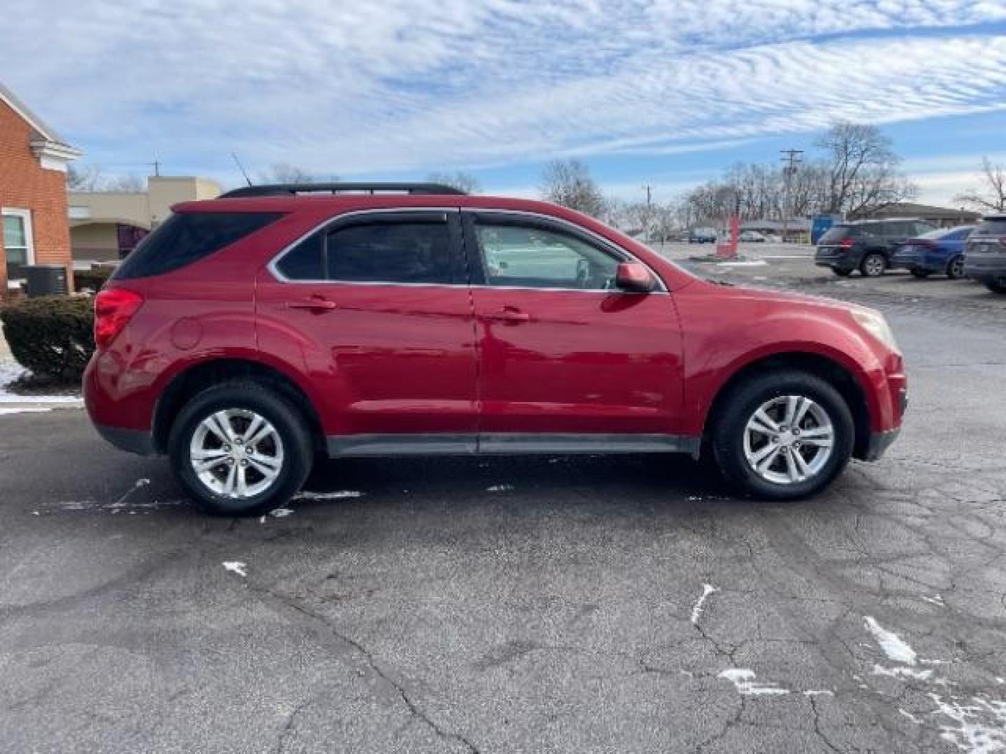 2013 Crystal Red Tintcoat Chevrolet Equinox 1LT AWD (2GNFLEEK4D6) with an 2.4L L4 DOHC 16V engine, 6-Speed Automatic transmission, located at 1951 S Dayton Lakeview Rd., New Carlisle, OH, 45344, (937) 908-9800, 39.890999, -84.050255 - Photo#2