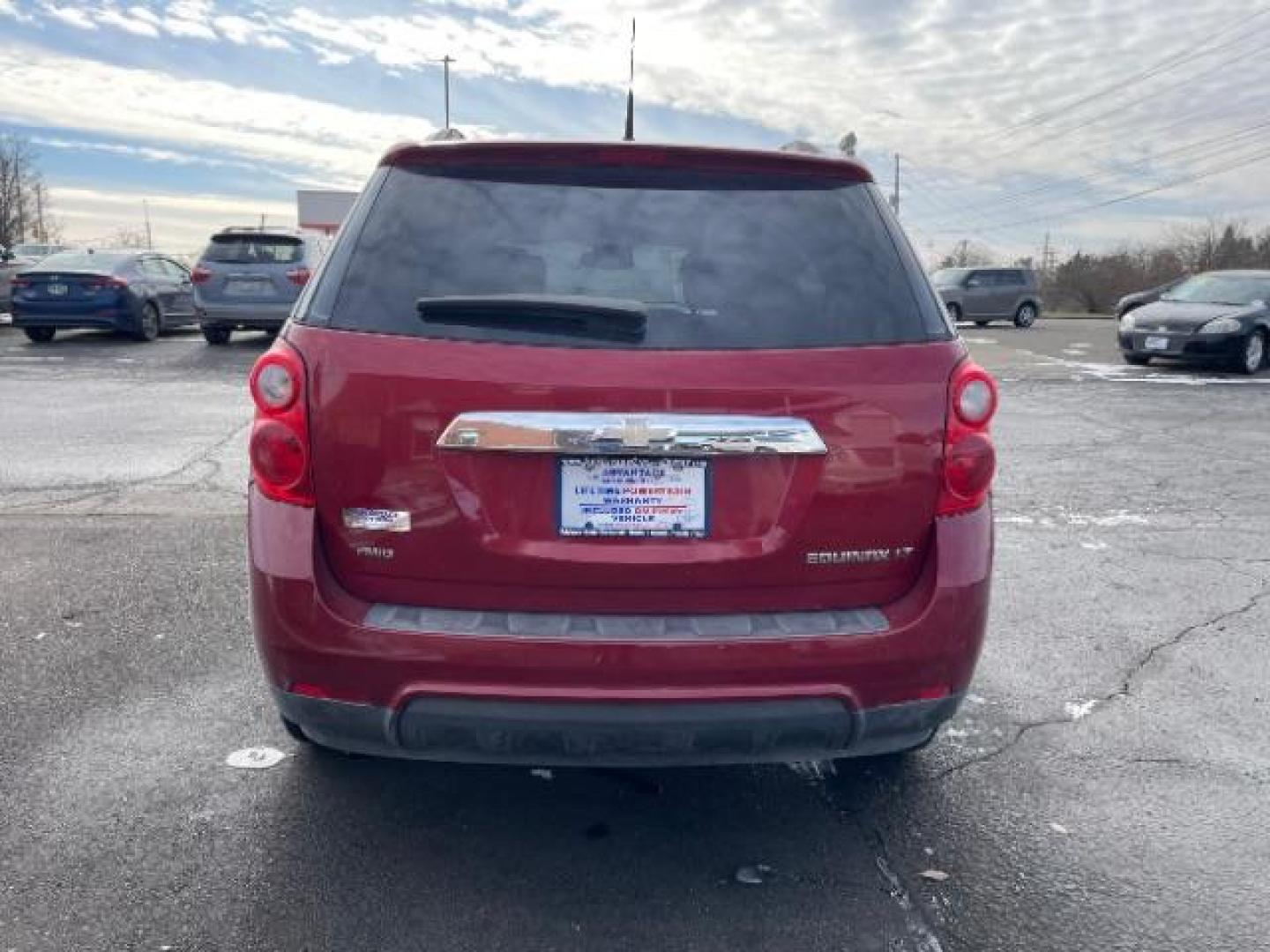 2013 Crystal Red Tintcoat Chevrolet Equinox 1LT AWD (2GNFLEEK4D6) with an 2.4L L4 DOHC 16V engine, 6-Speed Automatic transmission, located at 1951 S Dayton Lakeview Rd., New Carlisle, OH, 45344, (937) 908-9800, 39.890999, -84.050255 - Photo#3