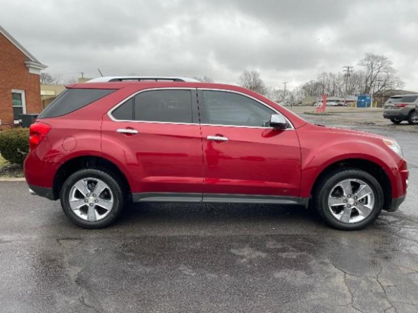 2013 Crystal Red Tintcoat Chevrolet Equinox LTZ AWD (2GNFLGE37D6) with an 3.6L V6 DOHC 24V engine, 6-Speed Automatic transmission, located at 401 Woodman Dr, Riverside, OH, 45431, (937) 908-9800, 39.763779, -84.122063 - Photo#2