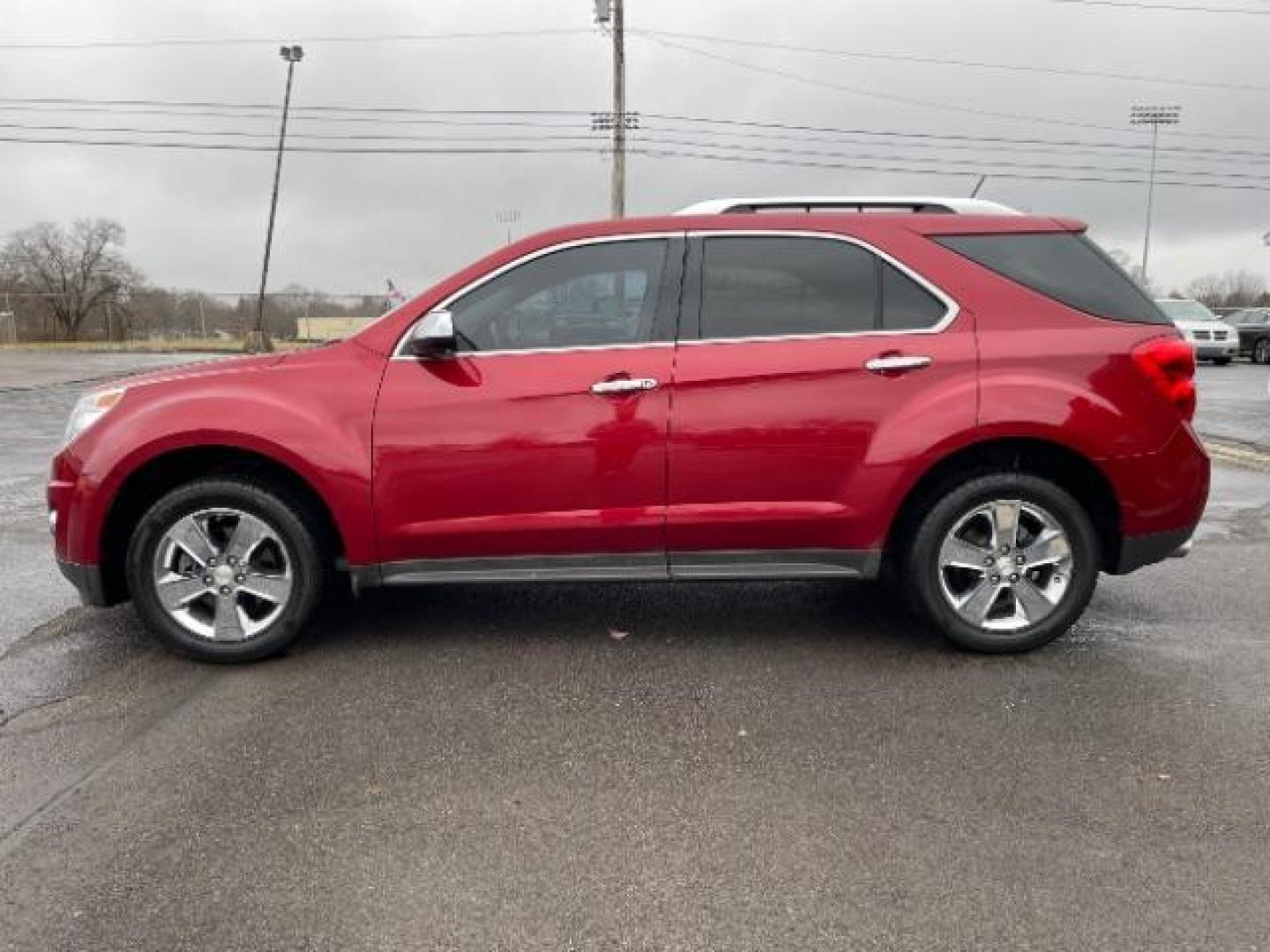 2013 Crystal Red Tintcoat Chevrolet Equinox LTZ AWD (2GNFLGE37D6) with an 3.6L V6 DOHC 24V engine, 6-Speed Automatic transmission, located at 401 Woodman Dr, Riverside, OH, 45431, (937) 908-9800, 39.763779, -84.122063 - Photo#3