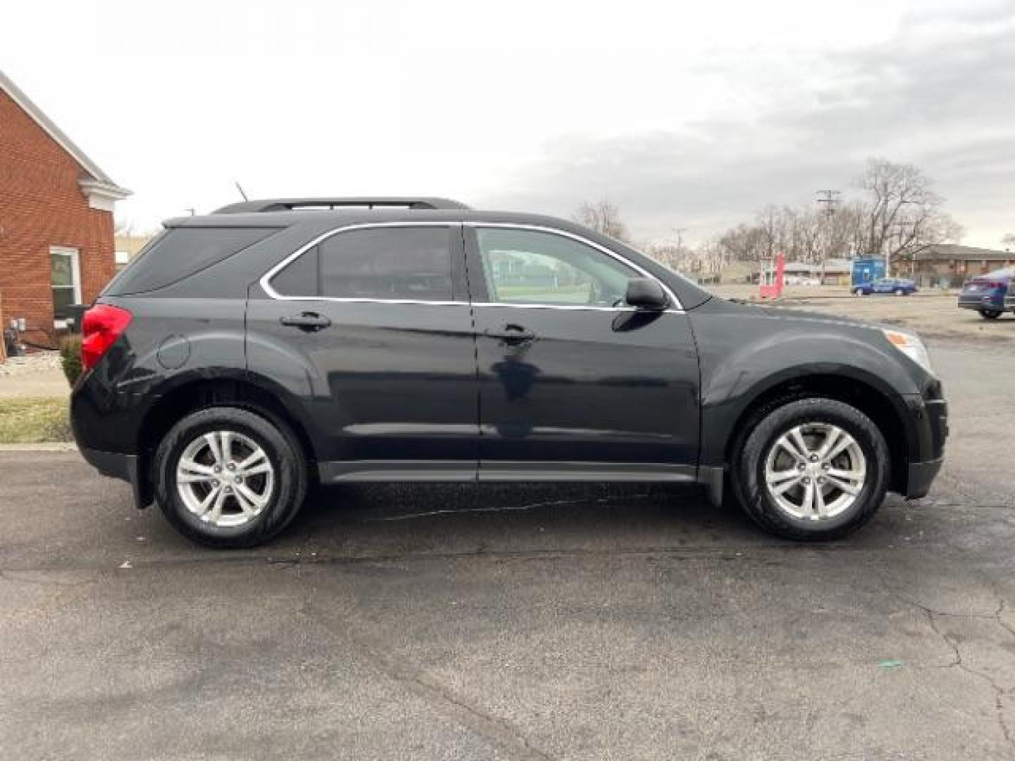 2013 Black Chevrolet Equinox 1LT 2WD (2GNALDEK9D6) with an 2.4L L4 DOHC 16V engine, 6-Speed Automatic transmission, located at 401 Woodman Dr, Riverside, OH, 45431, (937) 908-9800, 39.763779, -84.122063 - Photo#4