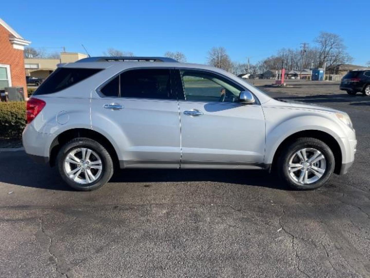 2013 Silver Ice Metallic Chevrolet Equinox LTZ 2WD (2GNALFEK0D6) with an 2.4L L4 DOHC 16V engine, 6-Speed Automatic transmission, located at 4508 South Dixie Dr, Moraine, OH, 45439, (937) 908-9800, 39.690136, -84.216438 - Photo#2