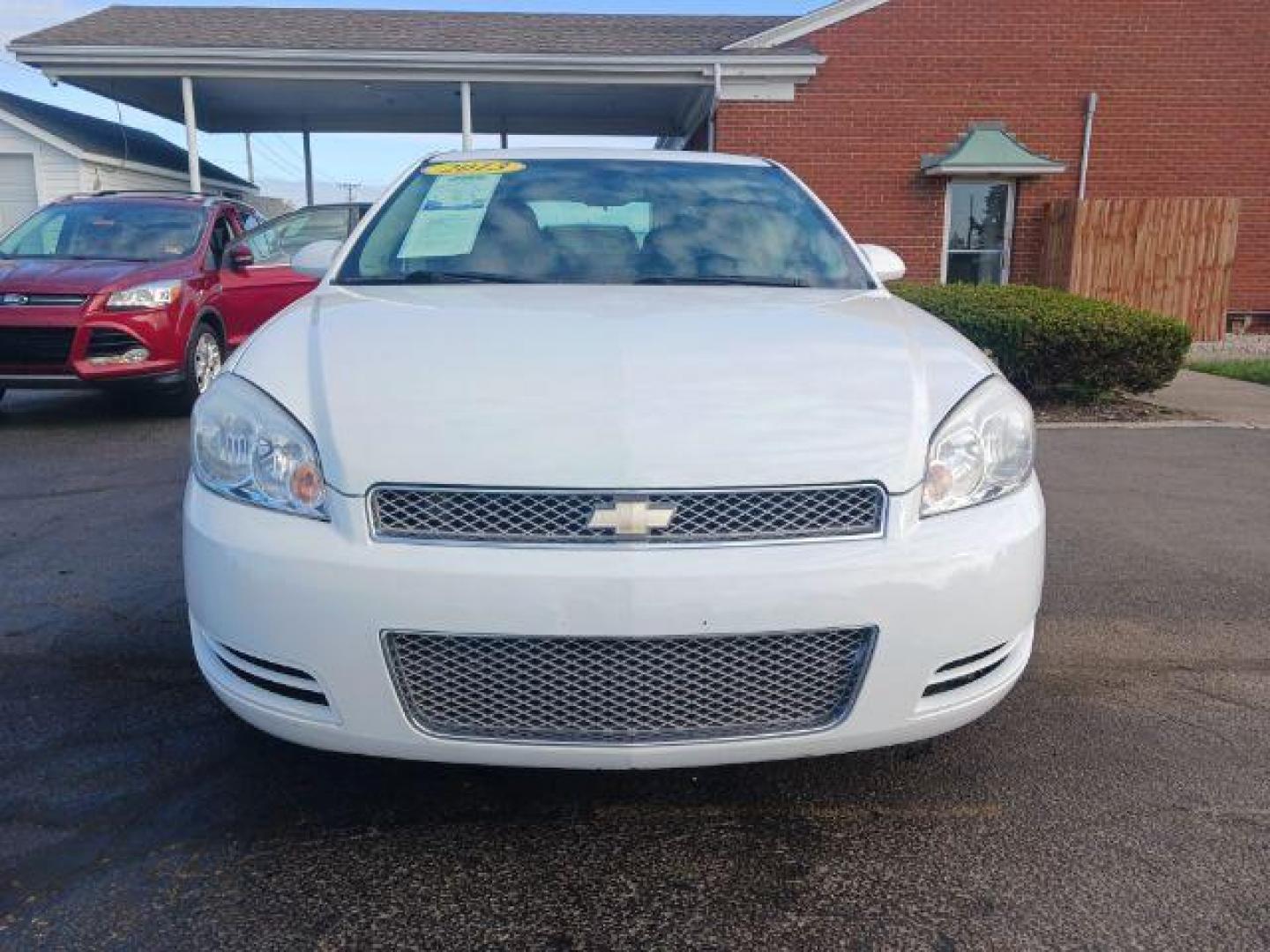 2013 White Chevrolet Impala LT (Fleet) (2G1WG5E34D1) with an 3.6L V6 DOHC 16V FFV engine, 6-Speed Automatic transmission, located at 1099 N County Rd 25A, OH, 45373, (937) 908-9800, 40.057079, -84.212883 - Photo#1