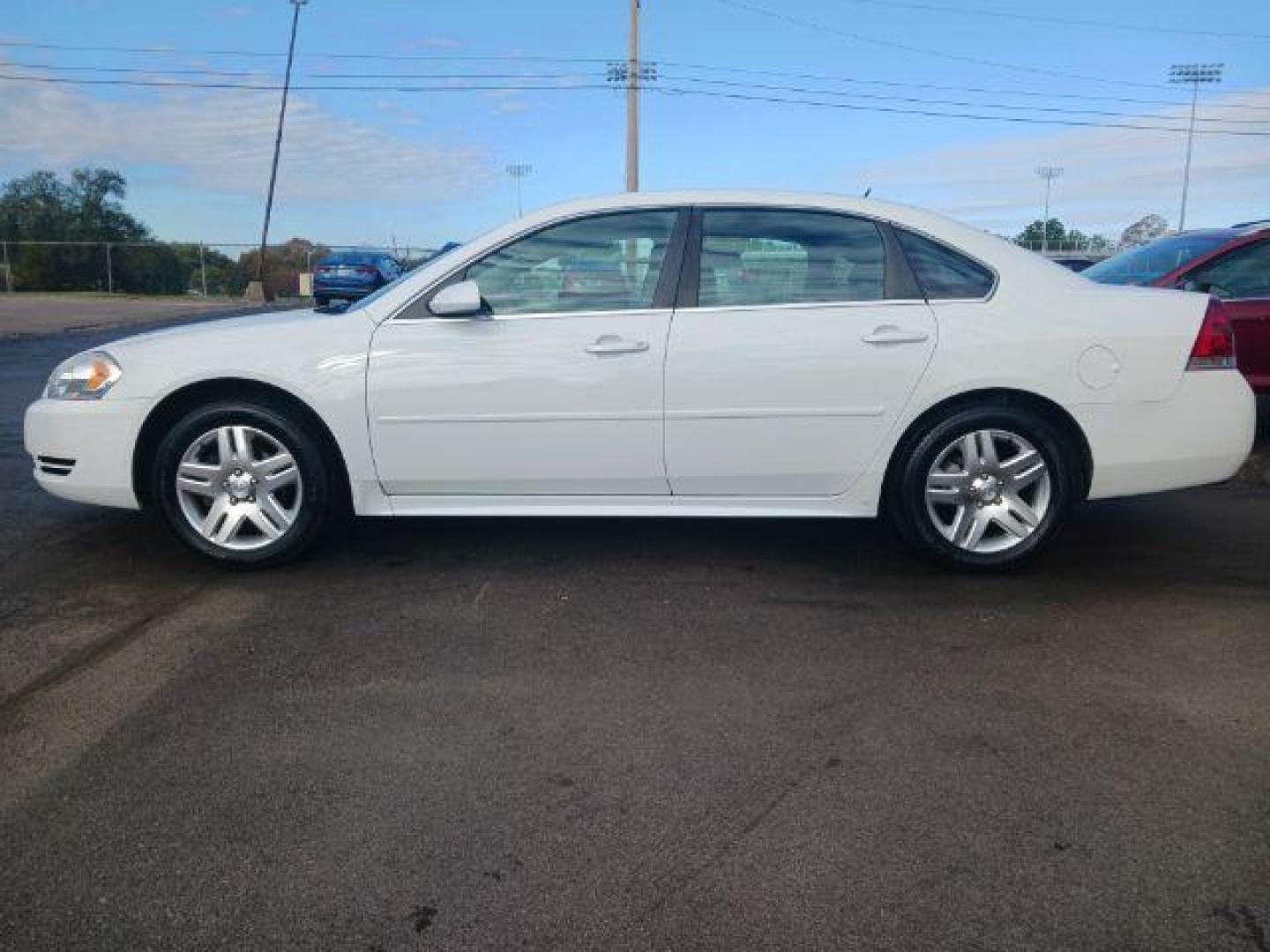 2013 White Chevrolet Impala LT (Fleet) (2G1WG5E34D1) with an 3.6L V6 DOHC 16V FFV engine, 6-Speed Automatic transmission, located at 1099 N County Rd 25A, OH, 45373, (937) 908-9800, 40.057079, -84.212883 - Photo#3