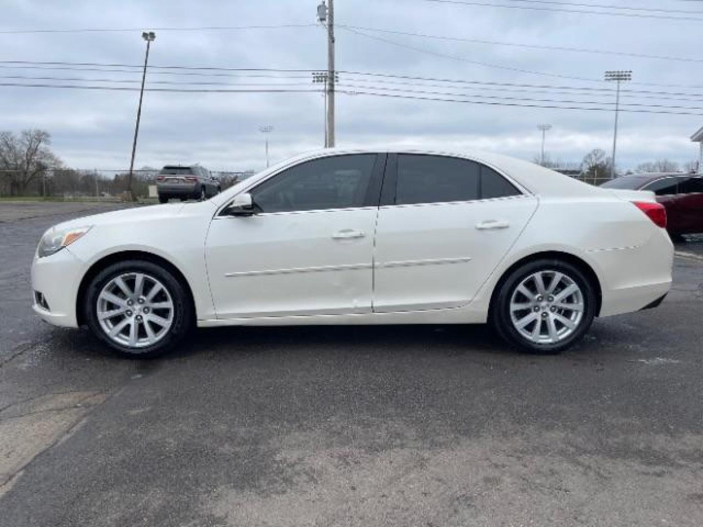 2013 White Diamond Tricoat Chevrolet Malibu 2LT (1G11E5SAXDF) with an 2.5L L4 DOHC 16V engine, 6-Speed Automatic transmission, located at 1099 N County Rd 25A, OH, 45373, (937) 908-9800, 40.057079, -84.212883 - Photo#2