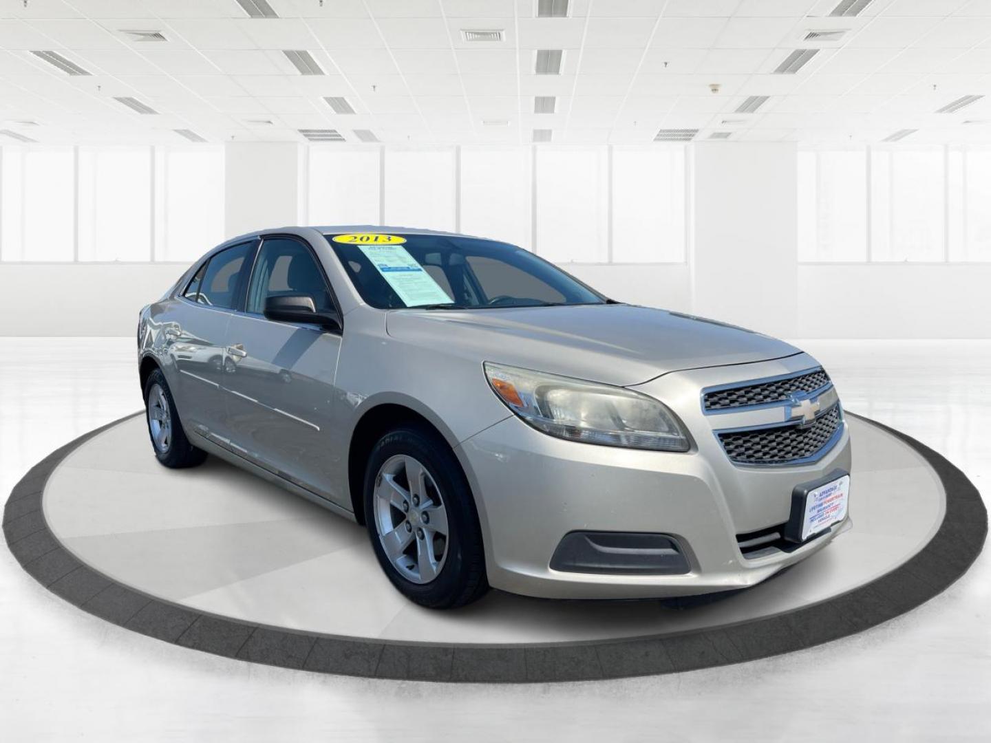 2013 Champagne Silver Metallic Chevrolet Malibu LS (1G11B5SA8DF) with an 2.5L L4 DOHC 16V engine, 6-Speed Automatic transmission, located at 4508 South Dixie Dr, Moraine, OH, 45439, (937) 908-9800, 39.690136, -84.216438 - Photo#0