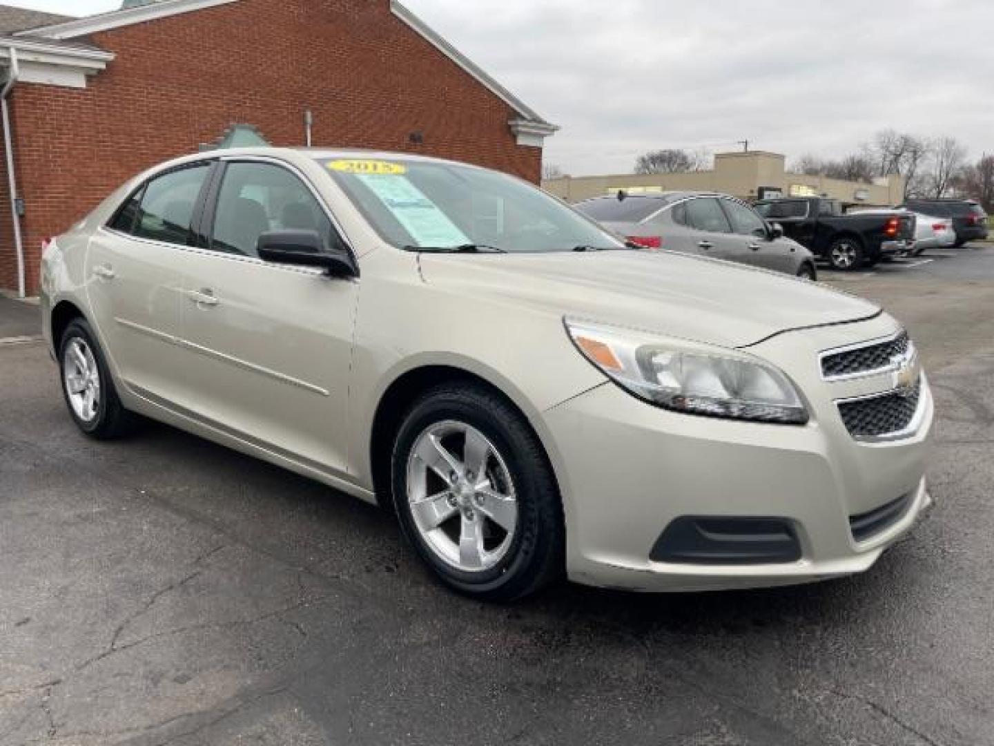 2013 Champagne Silver Metallic Chevrolet Malibu LS (1G11B5SA1DF) with an 2.5L L4 DOHC 16V engine, 6-Speed Automatic transmission, located at 1230 East Main St, Xenia, OH, 45385, (937) 908-9800, 39.687321, -83.910294 - Photo#0