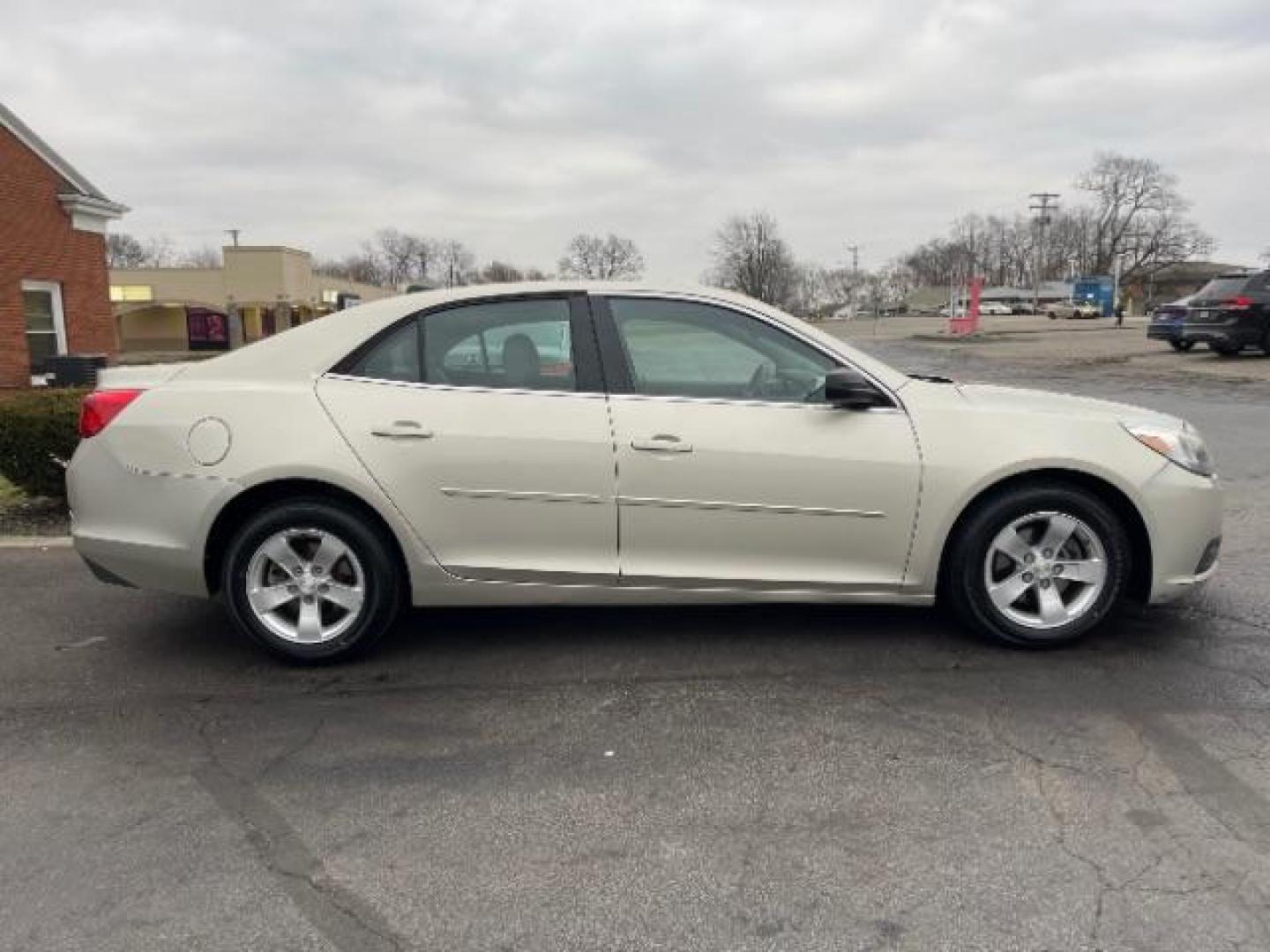 2013 Champagne Silver Metallic Chevrolet Malibu LS (1G11B5SA1DF) with an 2.5L L4 DOHC 16V engine, 6-Speed Automatic transmission, located at 1230 East Main St, Xenia, OH, 45385, (937) 908-9800, 39.687321, -83.910294 - Photo#3