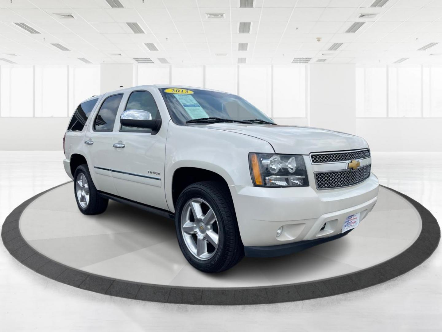 2013 Chevrolet Tahoe LTZ 4WD (1GNSKCE06DR) with an 5.3L V8 OHV 16V FFV engine, 6-Speed Automatic transmission, located at 401 Woodman Dr, Riverside, OH, 45431, (937) 908-9800, 39.760899, -84.123421 - Third Row - Photo#0