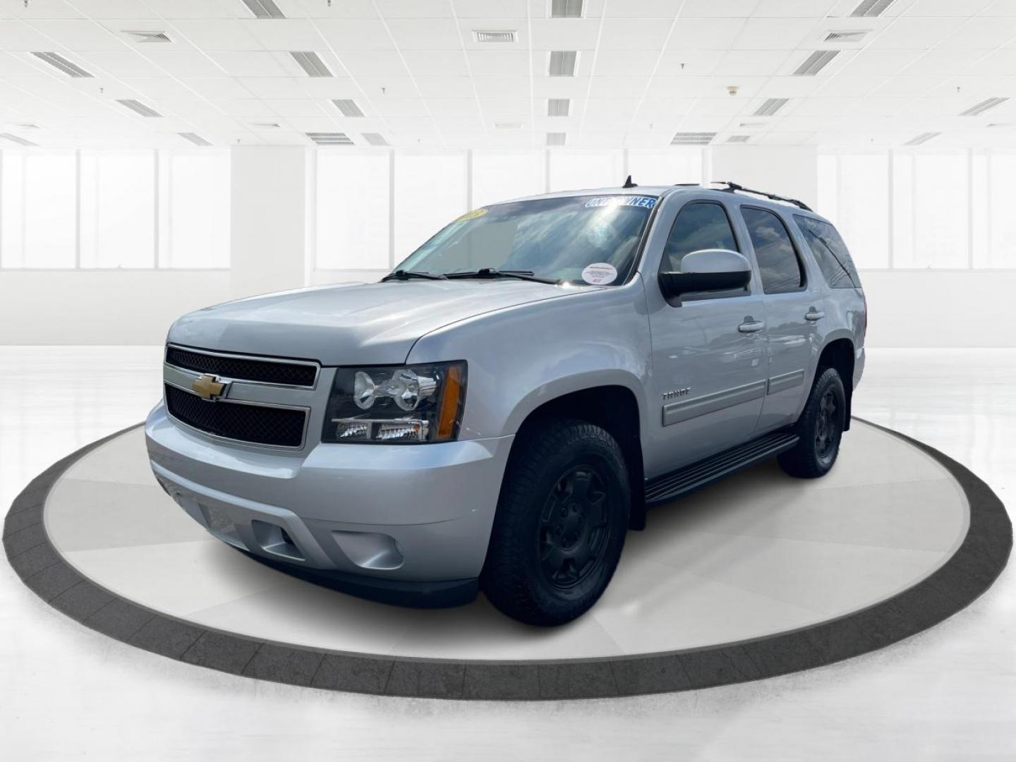 2013 Silver Ice Metallic Chevrolet Tahoe (1GNSKAE04DR) with an 5.3L V8 OHV 16V FFV engine, 6-Speed Automatic transmission, located at 1951 S Dayton Lakeview Rd., New Carlisle, OH, 45344, (937) 908-9800, 39.890999, -84.050255 - Photo#7