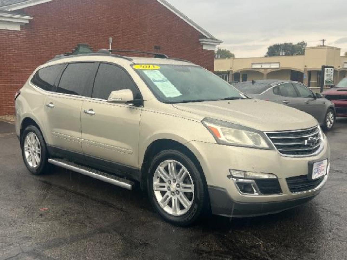 2013 Champagne Silver Metallic Chevrolet Traverse 1LT FWD (1GNKRGKD7DJ) with an 3.6L V6 DOHC 24V engine, 6-Speed Automatic transmission, located at 1230 East Main St, Xenia, OH, 45385, (937) 908-9800, 39.687321, -83.910294 - Third Row - Photo#0