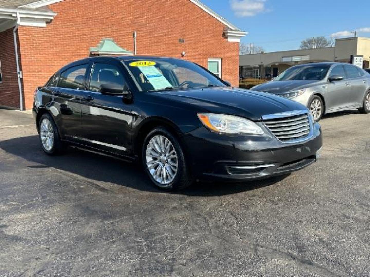 2013 Black Chrysler 200 LX (1C3CCBABXDN) with an 2.4L L4 DOHC 16V engine, 6-Speed Automatic transmission, located at 1951 S Dayton Lakeview Rd., New Carlisle, OH, 45344, (937) 908-9800, 39.890999, -84.050255 - Photo#0