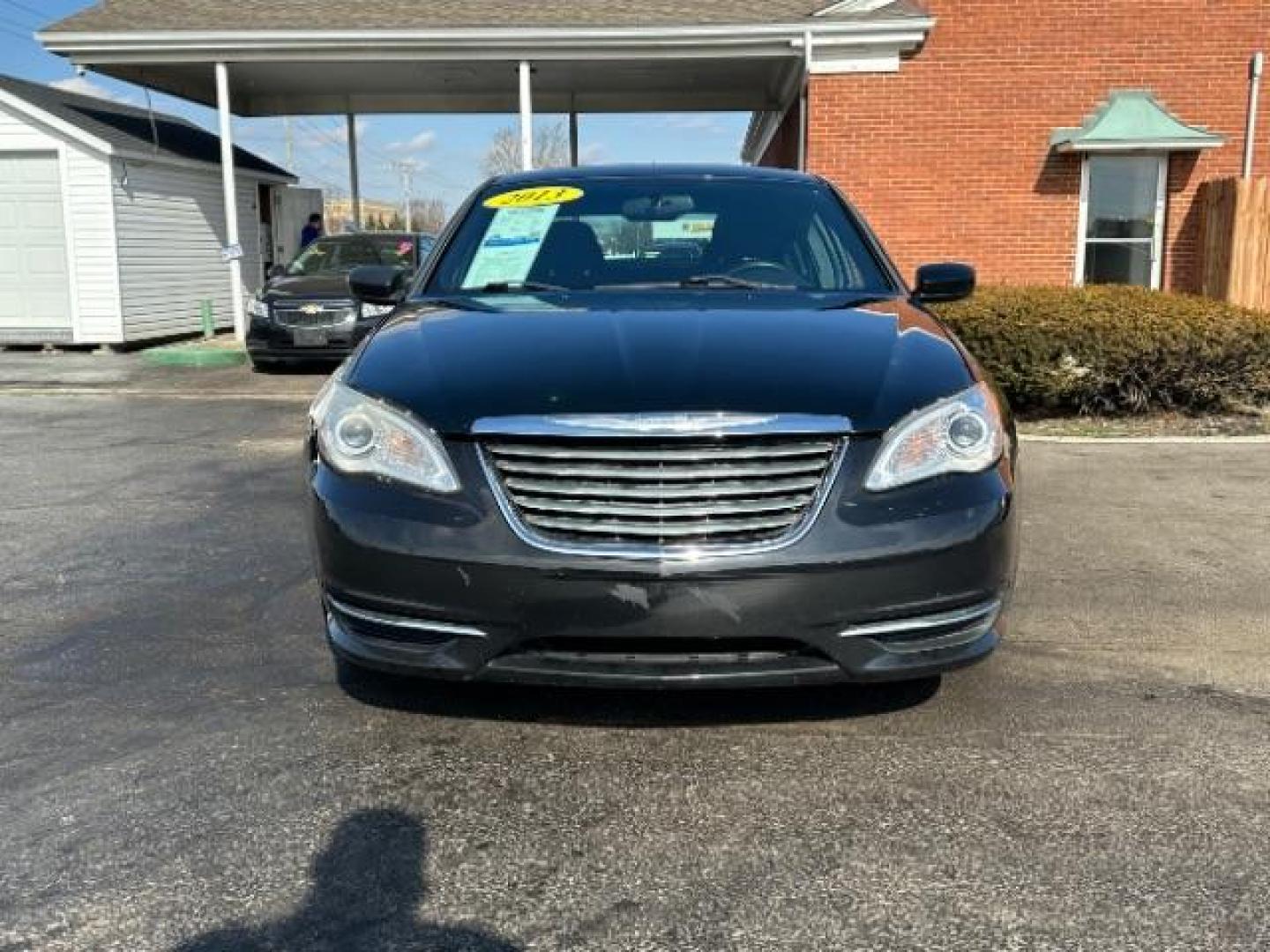 2013 Black Chrysler 200 LX (1C3CCBABXDN) with an 2.4L L4 DOHC 16V engine, 6-Speed Automatic transmission, located at 1951 S Dayton Lakeview Rd., New Carlisle, OH, 45344, (937) 908-9800, 39.890999, -84.050255 - Photo#1