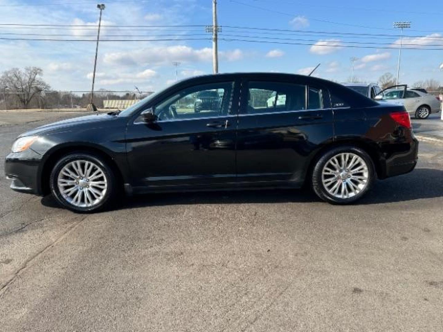 2013 Black Chrysler 200 LX (1C3CCBABXDN) with an 2.4L L4 DOHC 16V engine, 6-Speed Automatic transmission, located at 1951 S Dayton Lakeview Rd., New Carlisle, OH, 45344, (937) 908-9800, 39.890999, -84.050255 - Photo#3