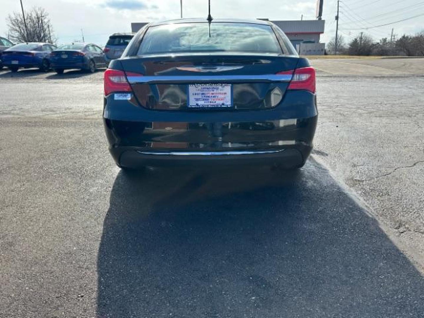 2013 Black Chrysler 200 LX (1C3CCBABXDN) with an 2.4L L4 DOHC 16V engine, 6-Speed Automatic transmission, located at 1951 S Dayton Lakeview Rd., New Carlisle, OH, 45344, (937) 908-9800, 39.890999, -84.050255 - Photo#4