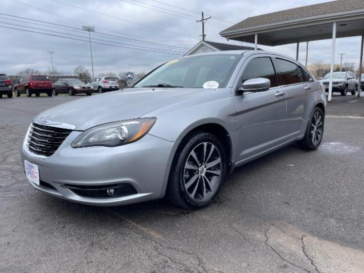 2013 Billet Silver Metallic Chrysler 200 Touring (1C3CCBBG8DN) with an 3.6L V6 DOHC 24V FFV engine, 6-Speed Automatic transmission, located at 880 E. National Road, Vandalia, OH, 45377, (937) 908-9800, 39.892189, -84.181015 - Photo#1