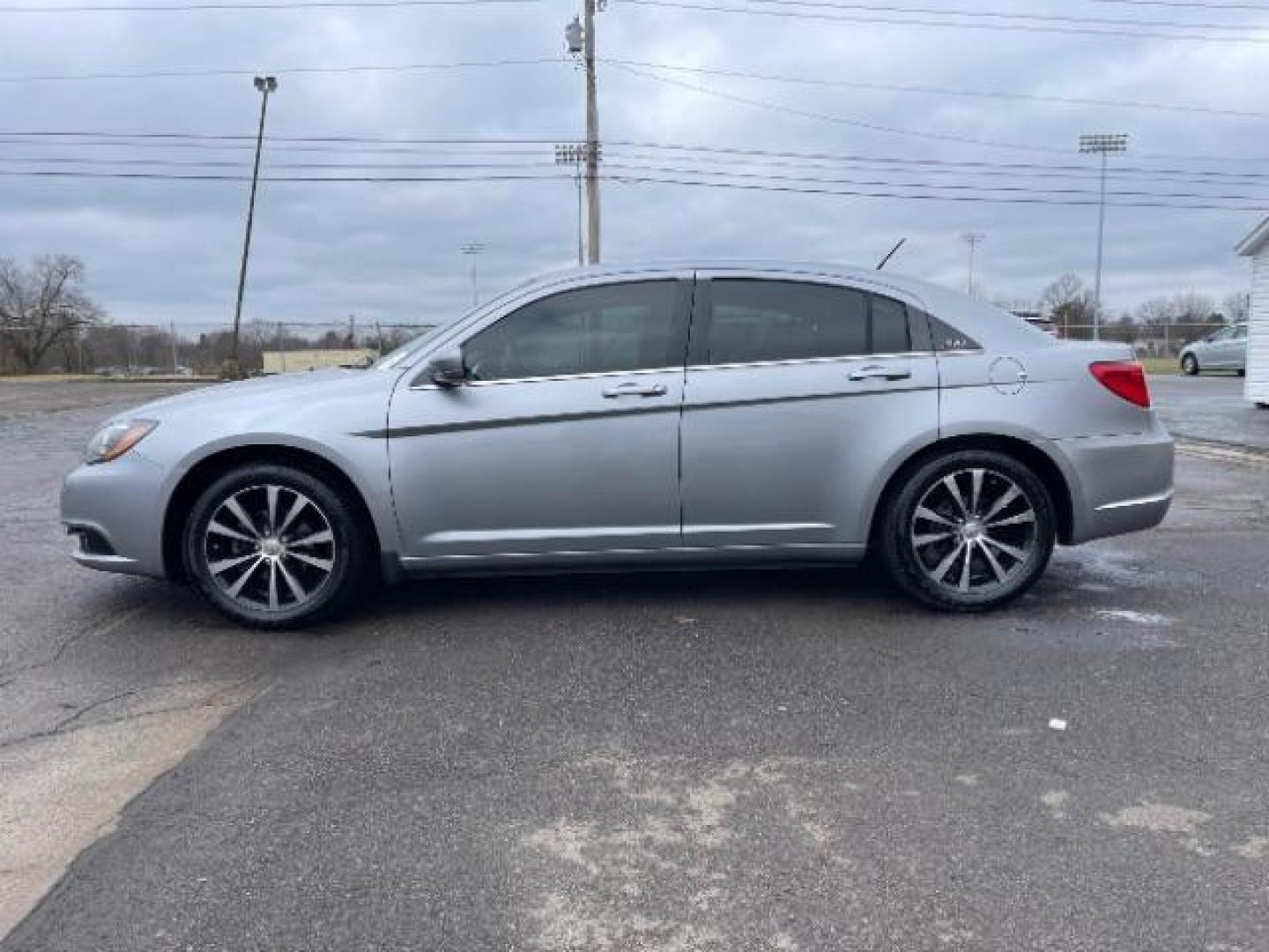 2013 Billet Silver Metallic Chrysler 200 Touring (1C3CCBBG8DN) with an 3.6L V6 DOHC 24V FFV engine, 6-Speed Automatic transmission, located at 880 E. National Road, Vandalia, OH, 45377, (937) 908-9800, 39.892189, -84.181015 - Photo#2