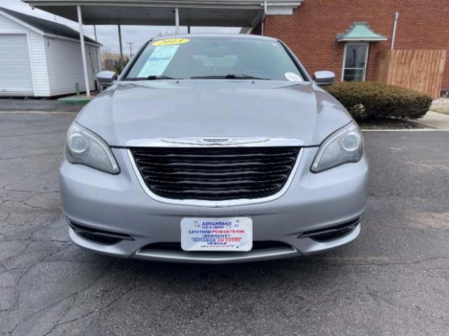 2013 Billet Silver Metallic Chrysler 200 Touring (1C3CCBBG8DN) with an 3.6L V6 DOHC 24V FFV engine, 6-Speed Automatic transmission, located at 880 E. National Road, Vandalia, OH, 45377, (937) 908-9800, 39.892189, -84.181015 - Photo#4