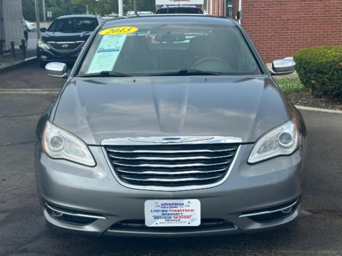 2013 Tungsten Metallic Chrysler 200 Limited (1C3CCBCG3DN) with an 3.6L V6 DOHC 24V FFV engine, 6-Speed Automatic transmission, located at 1230 East Main St, Xenia, OH, 45385, (937) 908-9800, 39.687321, -83.910294 - Photo#1