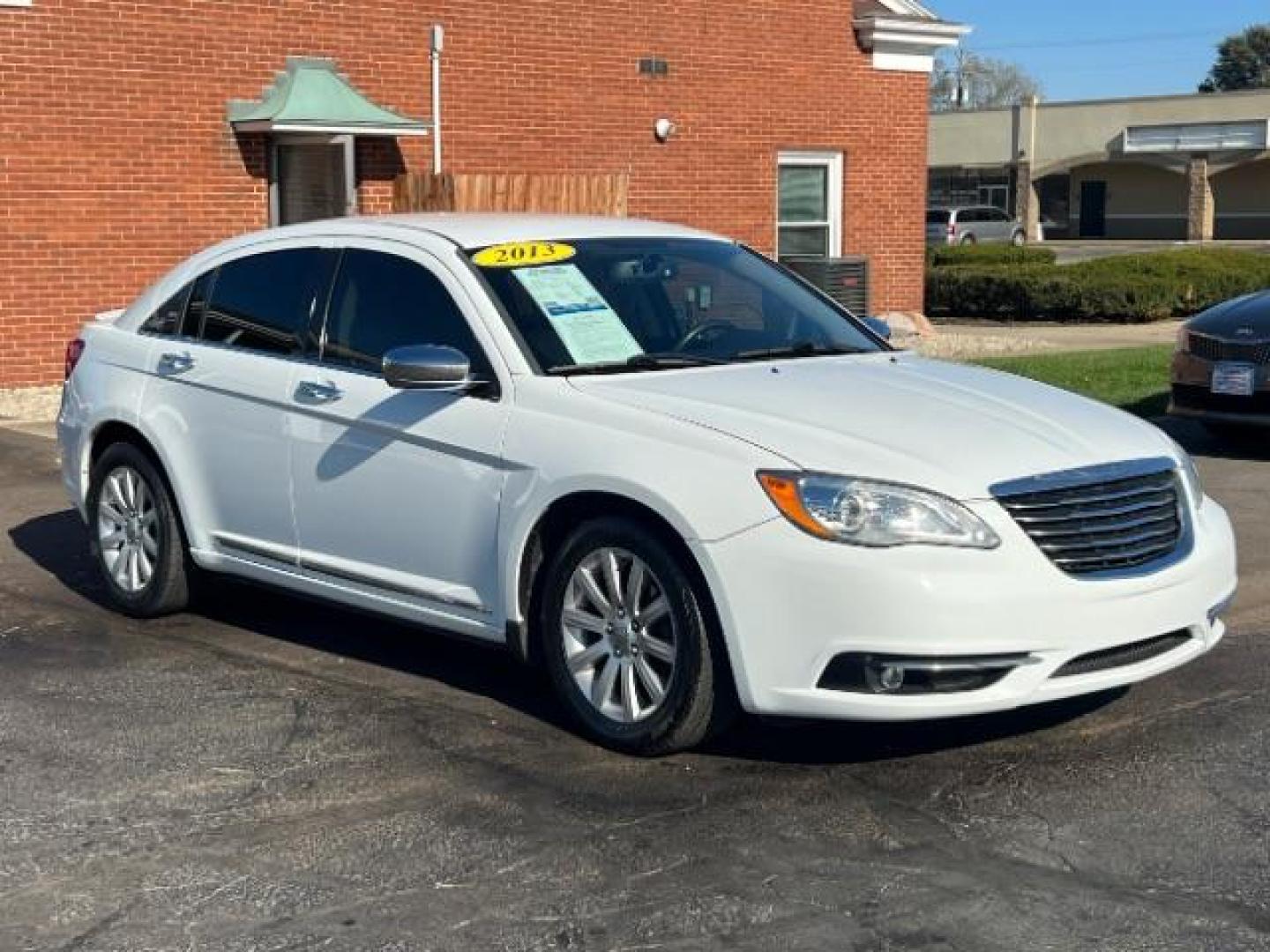 2013 Bright White Chrysler 200 Limited (1C3CCBCG9DN) with an 3.6L V6 DOHC 24V FFV engine, 6-Speed Automatic transmission, located at 1184 Kauffman Ave, Fairborn, OH, 45324, (937) 908-9800, 39.807365, -84.029114 - Photo#0