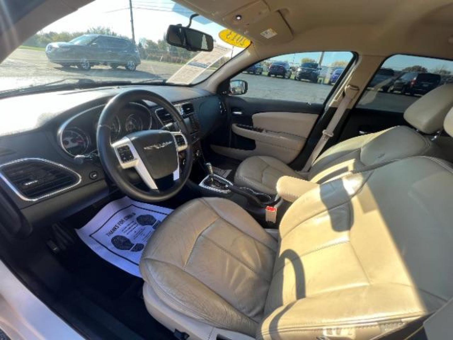 2013 Bright White Chrysler 200 Limited (1C3CCBCG9DN) with an 3.6L V6 DOHC 24V FFV engine, 6-Speed Automatic transmission, located at 1184 Kauffman Ave, Fairborn, OH, 45324, (937) 908-9800, 39.807365, -84.029114 - Photo#6