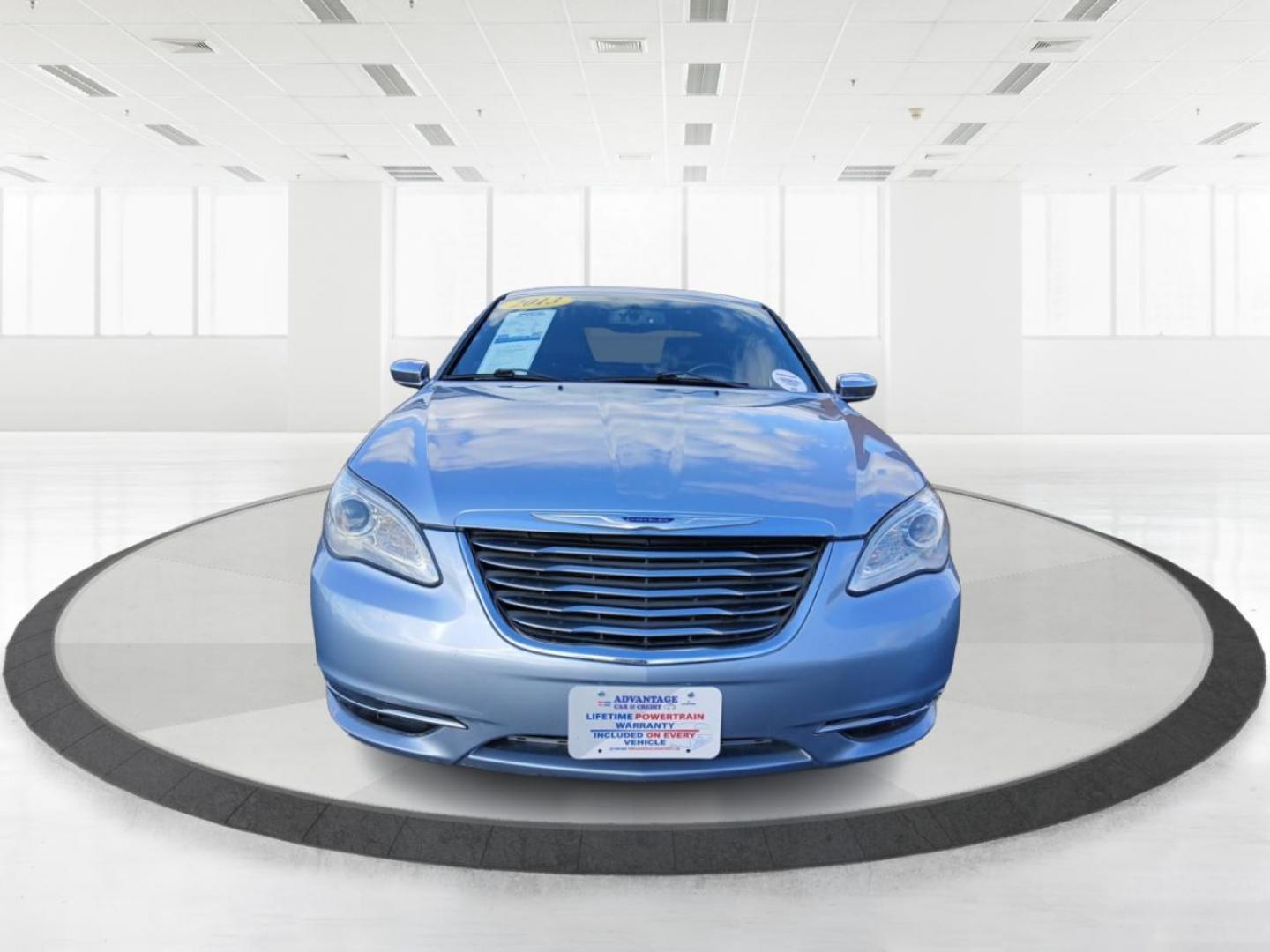 2013 Crystal Blue Pearl Chrysler 200 Limited (1C3CCBCG0DN) with an 3.6L V6 DOHC 24V FFV engine, 6-Speed Automatic transmission, located at 8750 N County Rd 25A, Piqua, OH, 45356, (937) 908-9800, 40.164391, -84.232513 - Photo#6