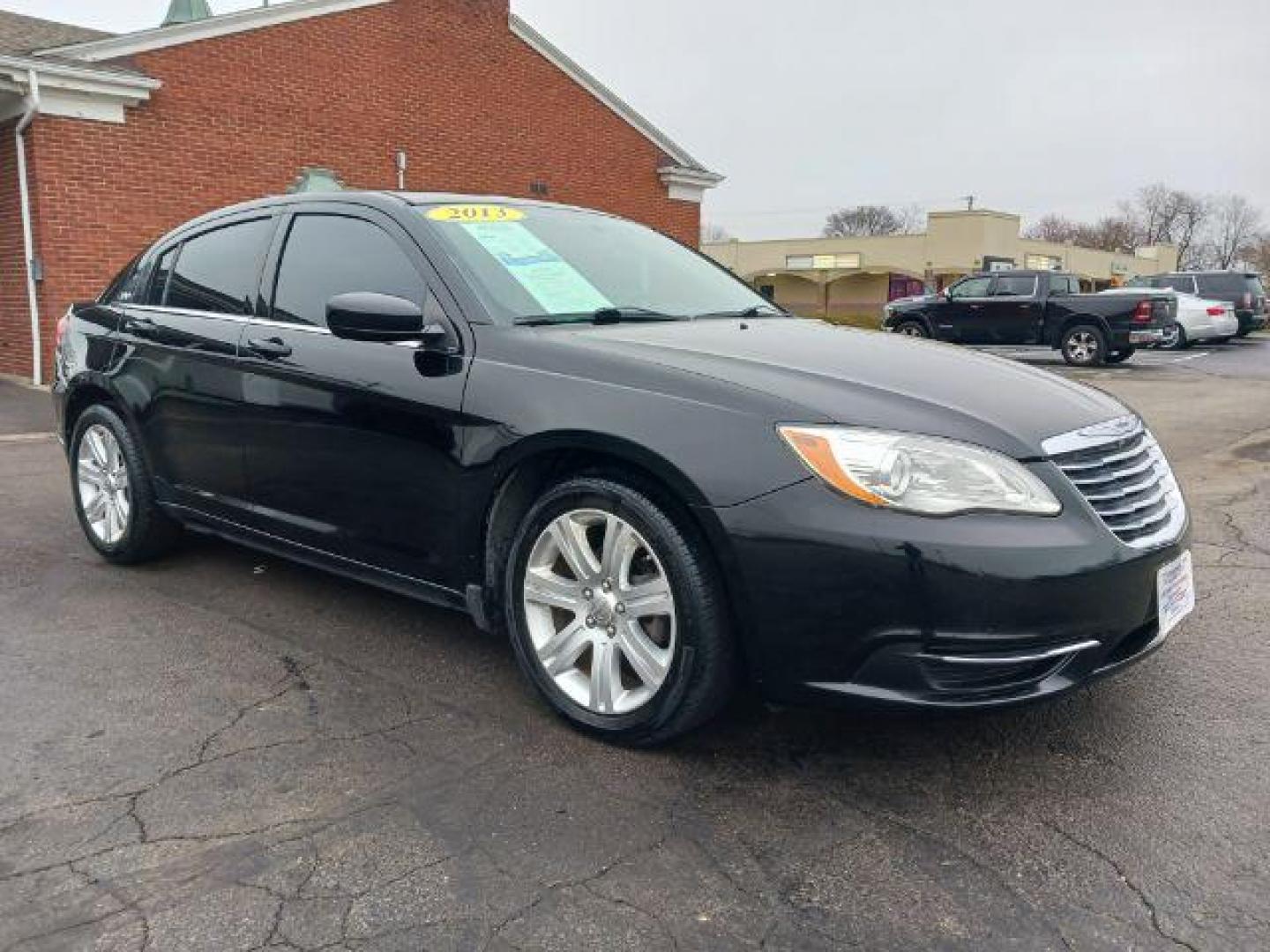 2013 Black Chrysler 200 Touring (1C3CCBBB8DN) with an 2.4L L4 DOHC 16V engine, 6-Speed Automatic transmission, located at 401 Woodman Dr, Riverside, OH, 45431, (937) 908-9800, 39.763779, -84.122063 - Photo#0