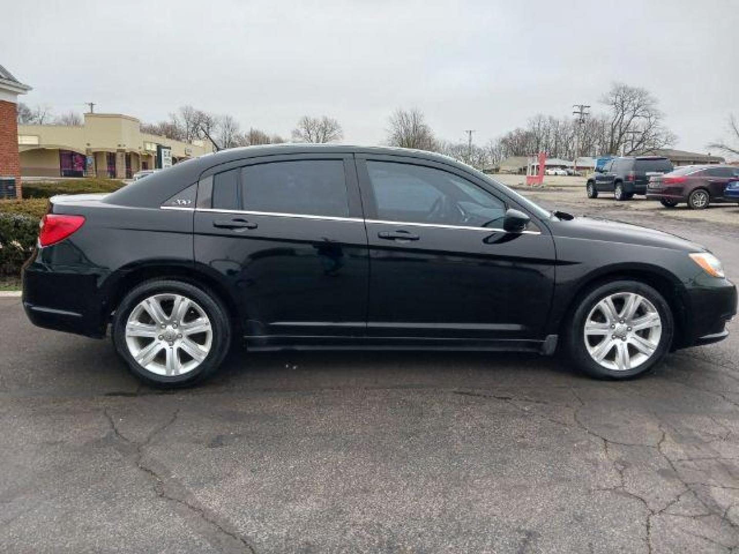 2013 Black Chrysler 200 Touring (1C3CCBBB8DN) with an 2.4L L4 DOHC 16V engine, 6-Speed Automatic transmission, located at 401 Woodman Dr, Riverside, OH, 45431, (937) 908-9800, 39.763779, -84.122063 - Photo#4