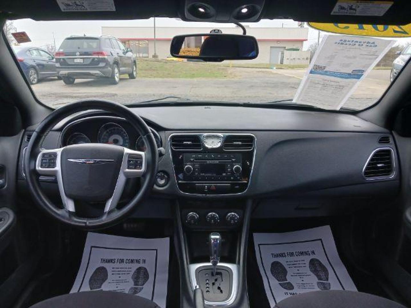 2013 Black Chrysler 200 Touring (1C3CCBBB8DN) with an 2.4L L4 DOHC 16V engine, 6-Speed Automatic transmission, located at 401 Woodman Dr, Riverside, OH, 45431, (937) 908-9800, 39.763779, -84.122063 - Photo#7