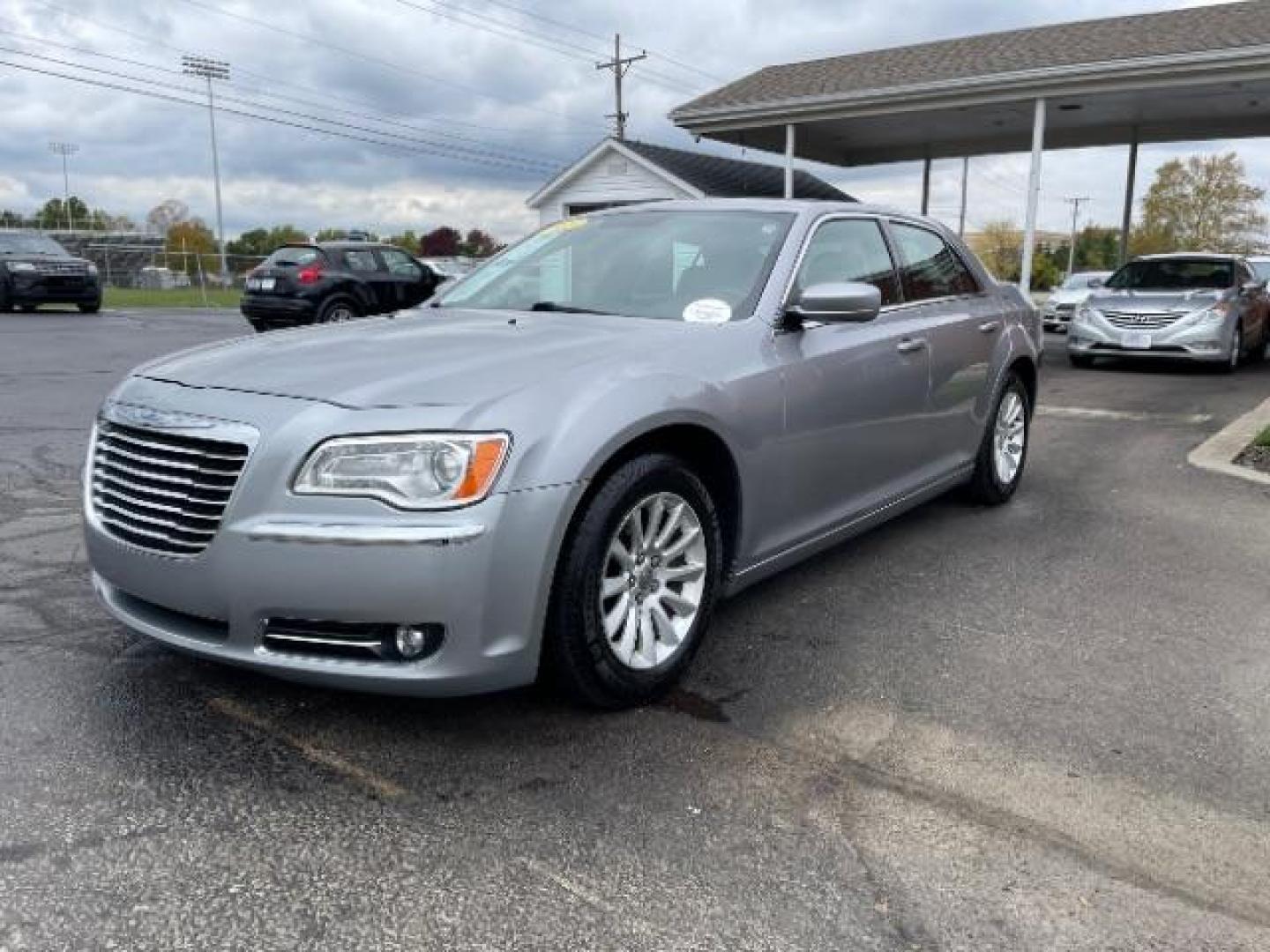 2013 Billet Silver Metallic Chrysler 300 RWD (2C3CCAAG3DH) with an 3.6L V6 SOHC 24V engine, 8-Speed Automatic transmission, located at 1099 N County Rd 25A, OH, 45373, (937) 908-9800, 40.057079, -84.212883 - Photo#1