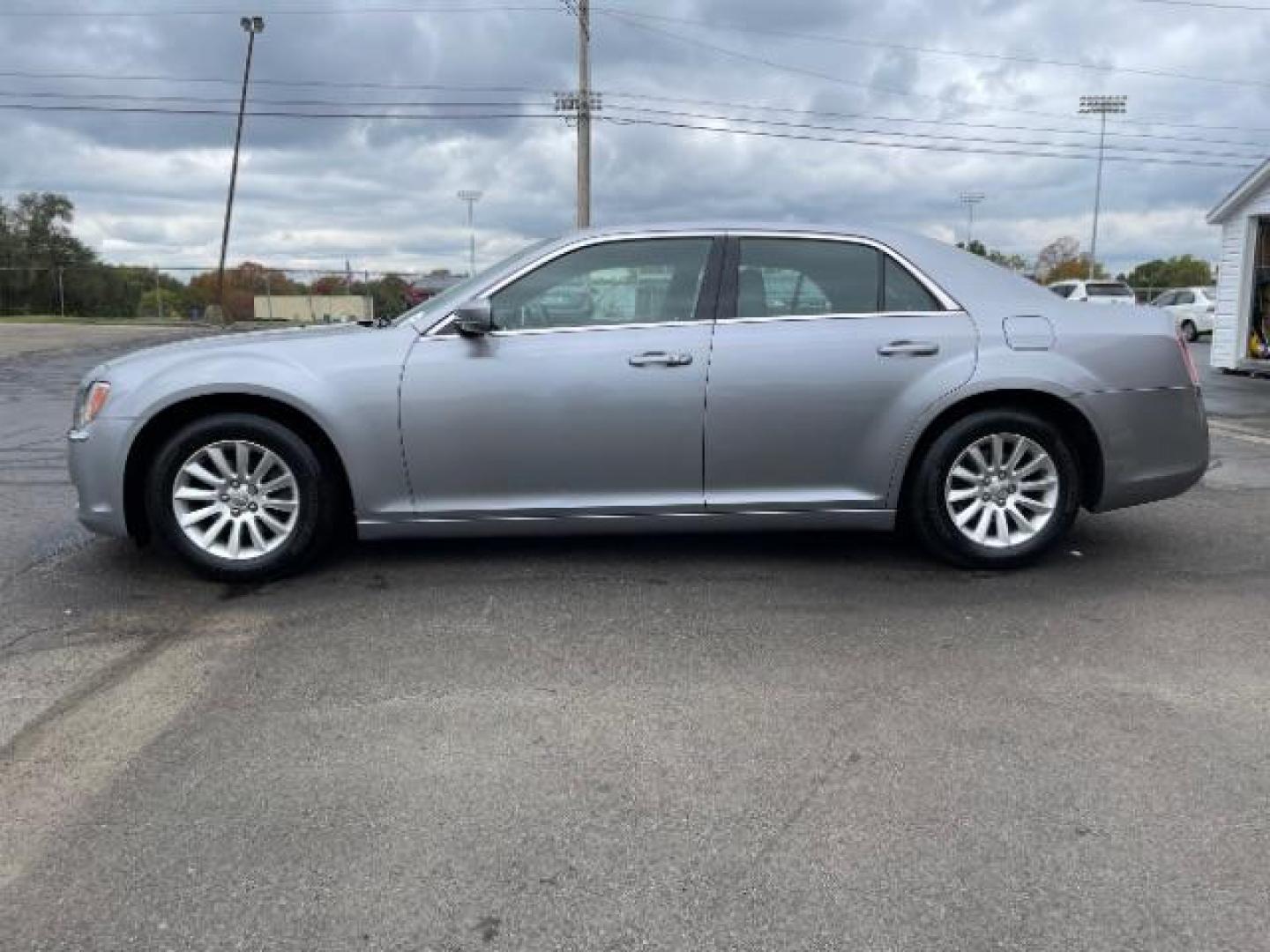 2013 Billet Silver Metallic Chrysler 300 RWD (2C3CCAAG3DH) with an 3.6L V6 SOHC 24V engine, 8-Speed Automatic transmission, located at 1099 N County Rd 25A, OH, 45373, (937) 908-9800, 40.057079, -84.212883 - Photo#2