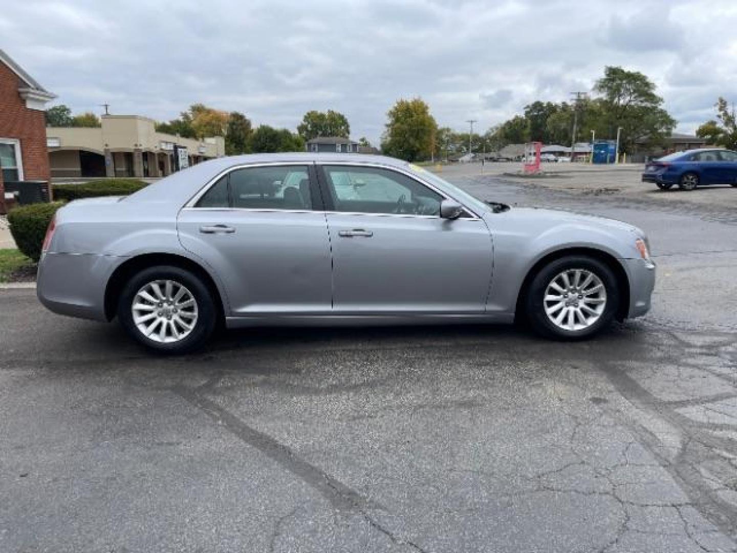 2013 Billet Silver Metallic Chrysler 300 RWD (2C3CCAAG3DH) with an 3.6L V6 SOHC 24V engine, 8-Speed Automatic transmission, located at 1099 N County Rd 25A, OH, 45373, (937) 908-9800, 40.057079, -84.212883 - Photo#3