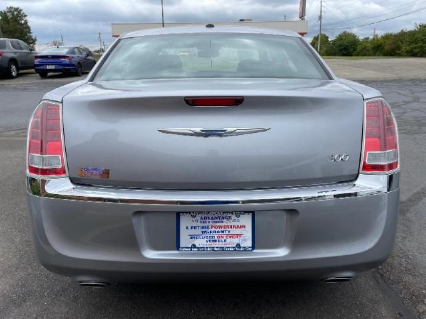 2013 Billet Silver Metallic Chrysler 300 RWD (2C3CCAAG3DH) with an 3.6L V6 SOHC 24V engine, 8-Speed Automatic transmission, located at 1099 N County Rd 25A, OH, 45373, (937) 908-9800, 40.057079, -84.212883 - Photo#4