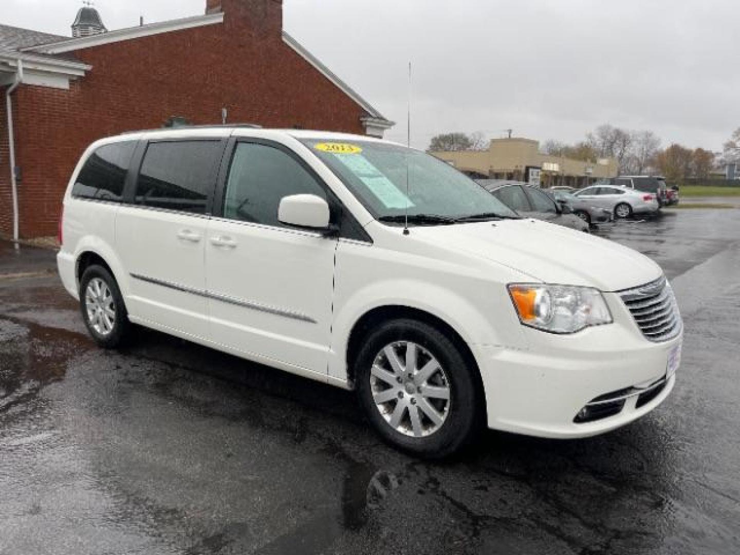 2013 Stone White Chrysler Town and Country Touring (2C4RC1BG7DR) with an 3.6L V6 DOHC 24V engine, 6-Speed Automatic transmission, located at 401 Woodman Dr, Riverside, OH, 45431, (937) 908-9800, 39.763779, -84.122063 - Photo#0