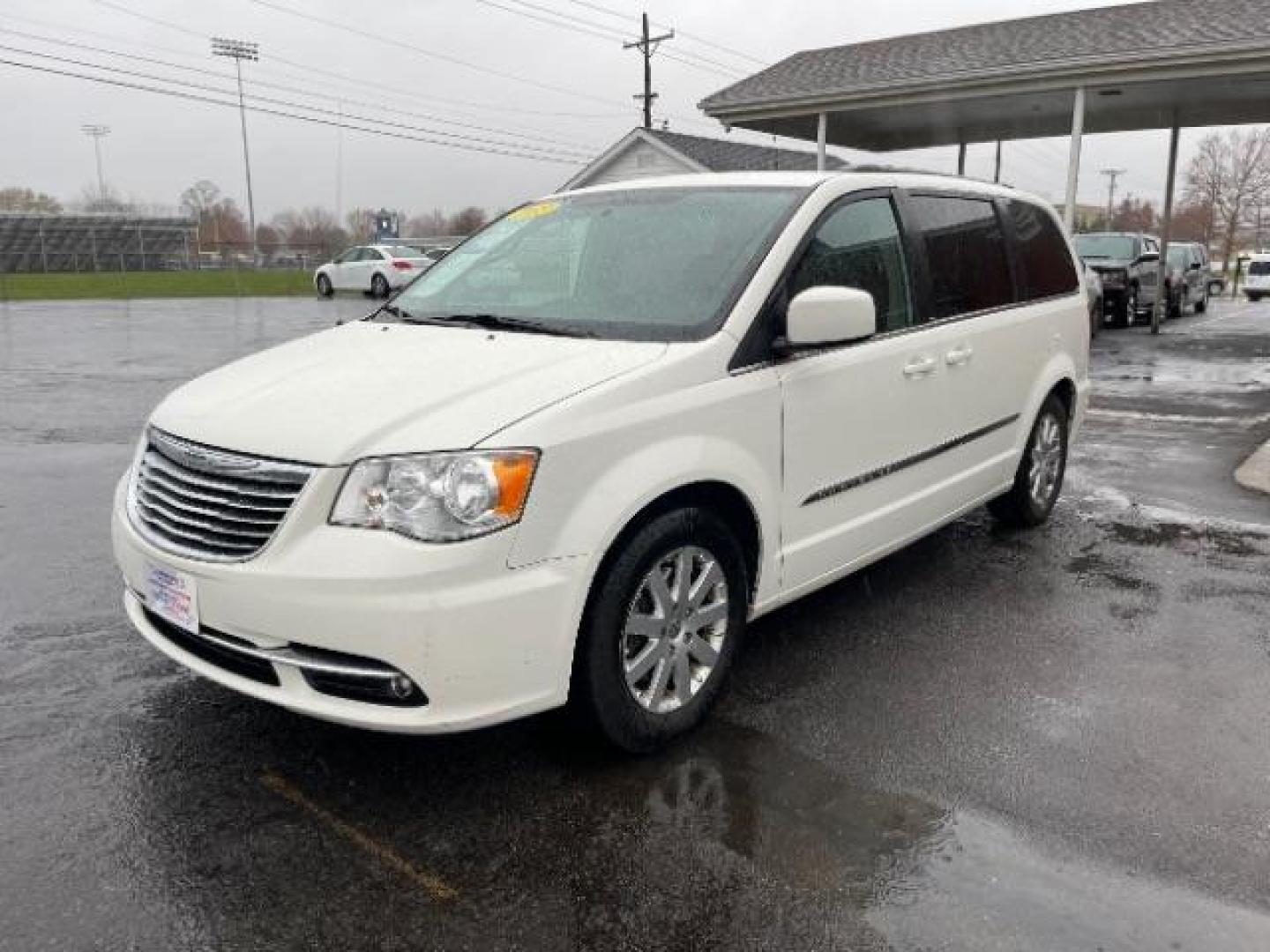 2013 Stone White Chrysler Town and Country Touring (2C4RC1BG7DR) with an 3.6L V6 DOHC 24V engine, 6-Speed Automatic transmission, located at 401 Woodman Dr, Riverside, OH, 45431, (937) 908-9800, 39.763779, -84.122063 - Photo#1