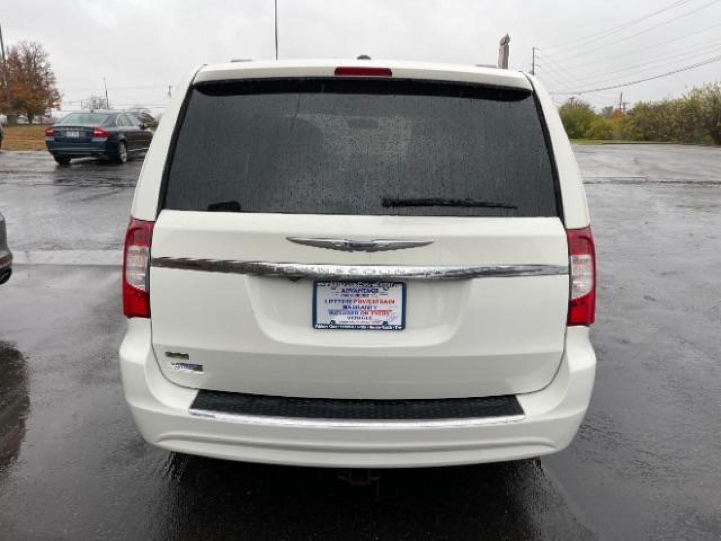 2013 Stone White Chrysler Town and Country Touring (2C4RC1BG7DR) with an 3.6L V6 DOHC 24V engine, 6-Speed Automatic transmission, located at 401 Woodman Dr, Riverside, OH, 45431, (937) 908-9800, 39.763779, -84.122063 - Photo#3