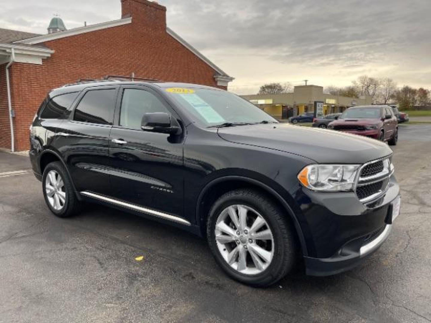 2013 Brilliant Black Crystal Pearl Dodge Durango Crew AWD (1C4RDJDG4DC) with an 3.6L V6 DOHC 24V engine, 5-Speed Automatic transmission, located at 1184 Kauffman Ave, Fairborn, OH, 45324, (937) 908-9800, 39.807365, -84.029114 - Photo#0