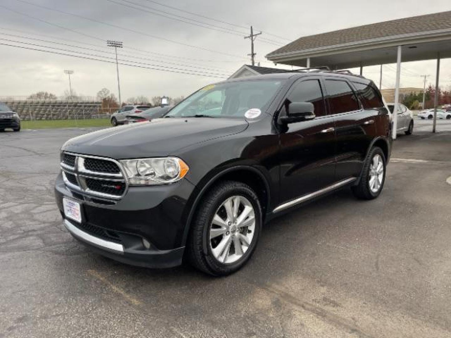 2013 Brilliant Black Crystal Pearl Dodge Durango Crew AWD (1C4RDJDG4DC) with an 3.6L V6 DOHC 24V engine, 5-Speed Automatic transmission, located at 1184 Kauffman Ave, Fairborn, OH, 45324, (937) 908-9800, 39.807365, -84.029114 - Photo#1