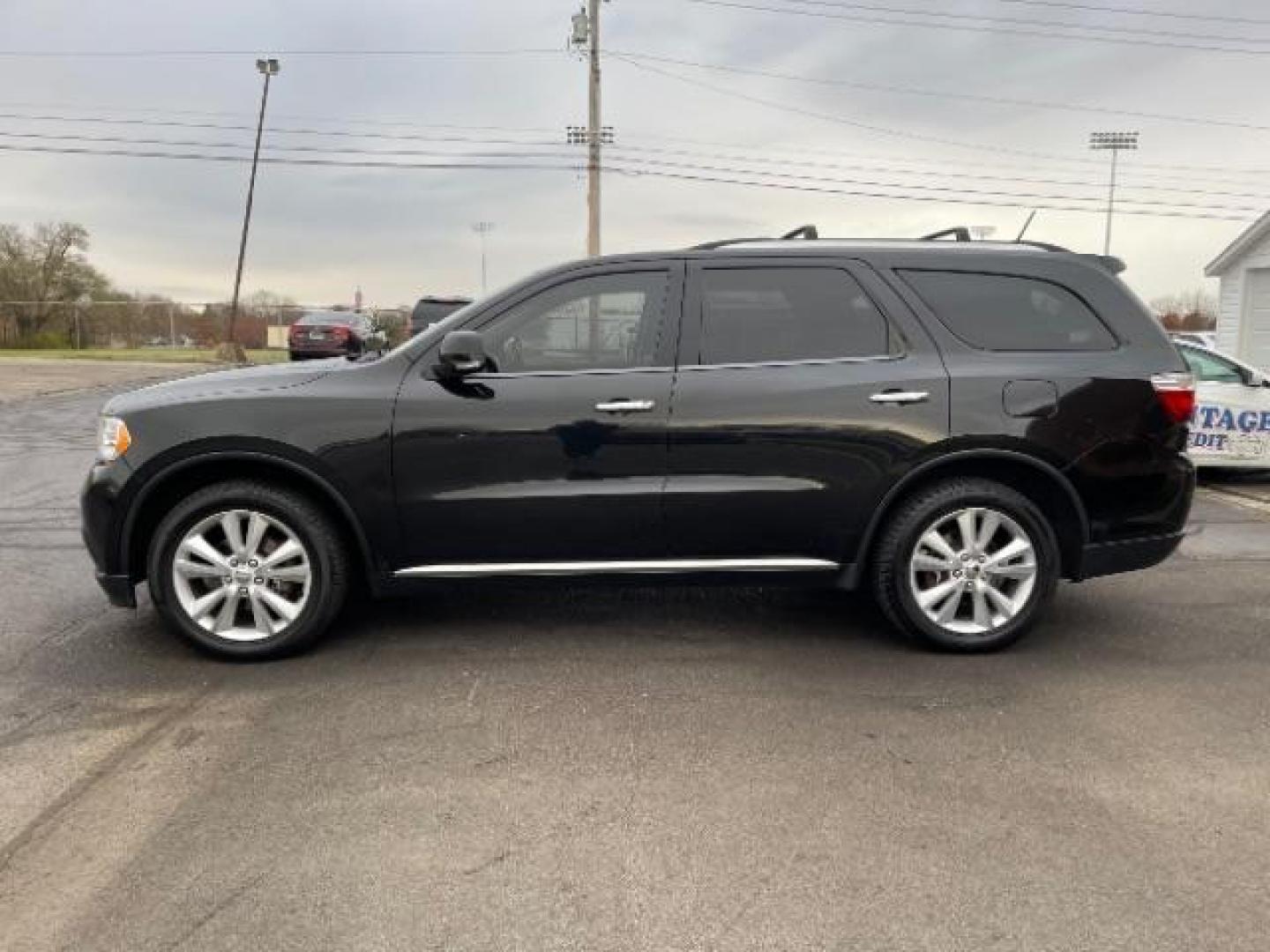 2013 Brilliant Black Crystal Pearl Dodge Durango Crew AWD (1C4RDJDG4DC) with an 3.6L V6 DOHC 24V engine, 5-Speed Automatic transmission, located at 1184 Kauffman Ave, Fairborn, OH, 45324, (937) 908-9800, 39.807365, -84.029114 - Photo#3