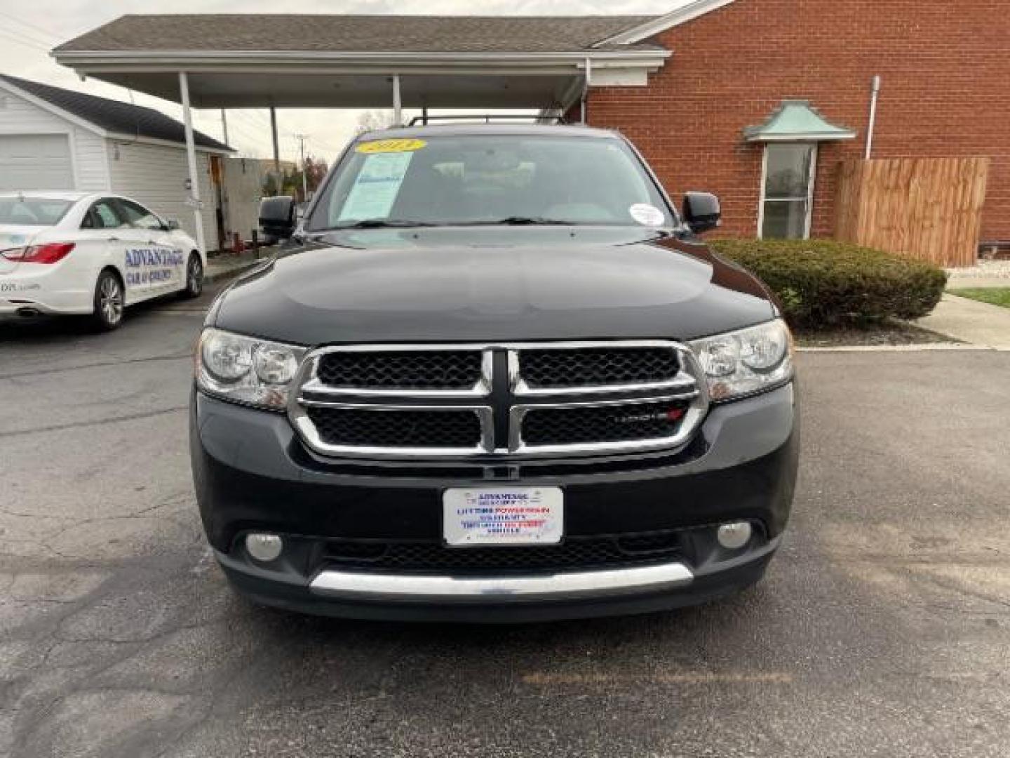 2013 Brilliant Black Crystal Pearl Dodge Durango Crew AWD (1C4RDJDG4DC) with an 3.6L V6 DOHC 24V engine, 5-Speed Automatic transmission, located at 1184 Kauffman Ave, Fairborn, OH, 45324, (937) 908-9800, 39.807365, -84.029114 - Photo#4