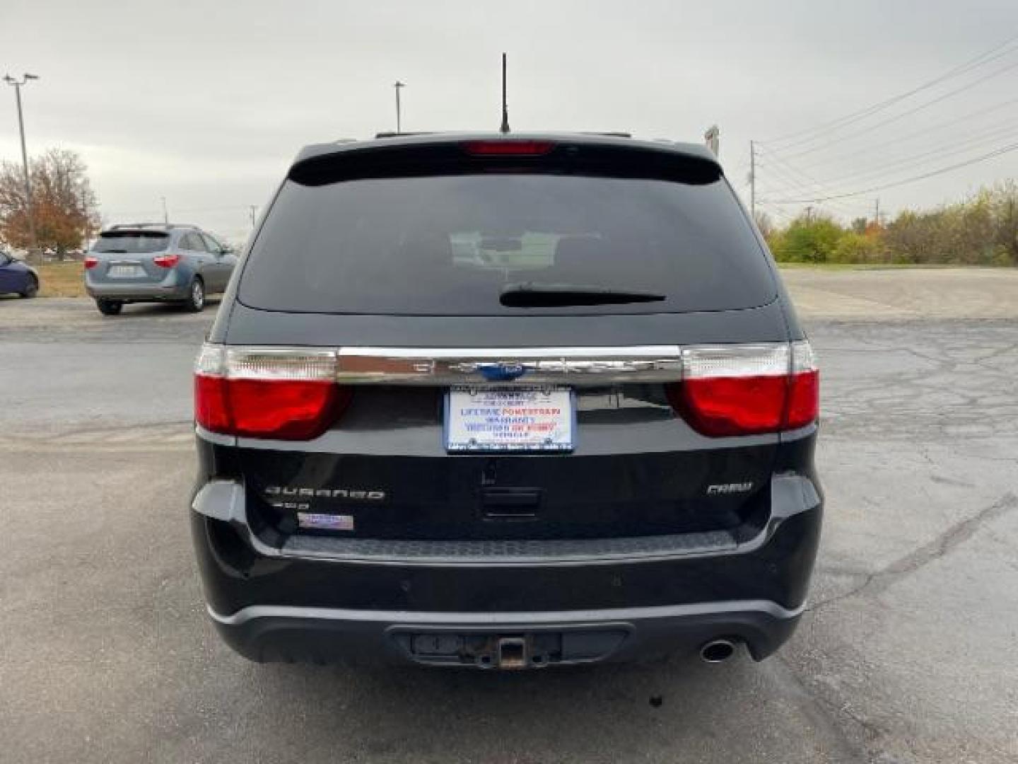 2013 Brilliant Black Crystal Pearl Dodge Durango Crew AWD (1C4RDJDG4DC) with an 3.6L V6 DOHC 24V engine, 5-Speed Automatic transmission, located at 1184 Kauffman Ave, Fairborn, OH, 45324, (937) 908-9800, 39.807365, -84.029114 - Photo#5