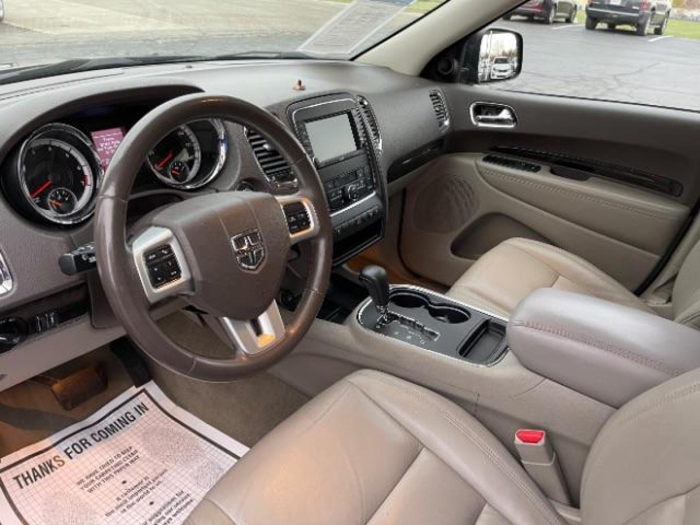 2013 Brilliant Black Crystal Pearl Dodge Durango Crew AWD (1C4RDJDG4DC) with an 3.6L V6 DOHC 24V engine, 5-Speed Automatic transmission, located at 1184 Kauffman Ave, Fairborn, OH, 45324, (937) 908-9800, 39.807365, -84.029114 - Photo#6