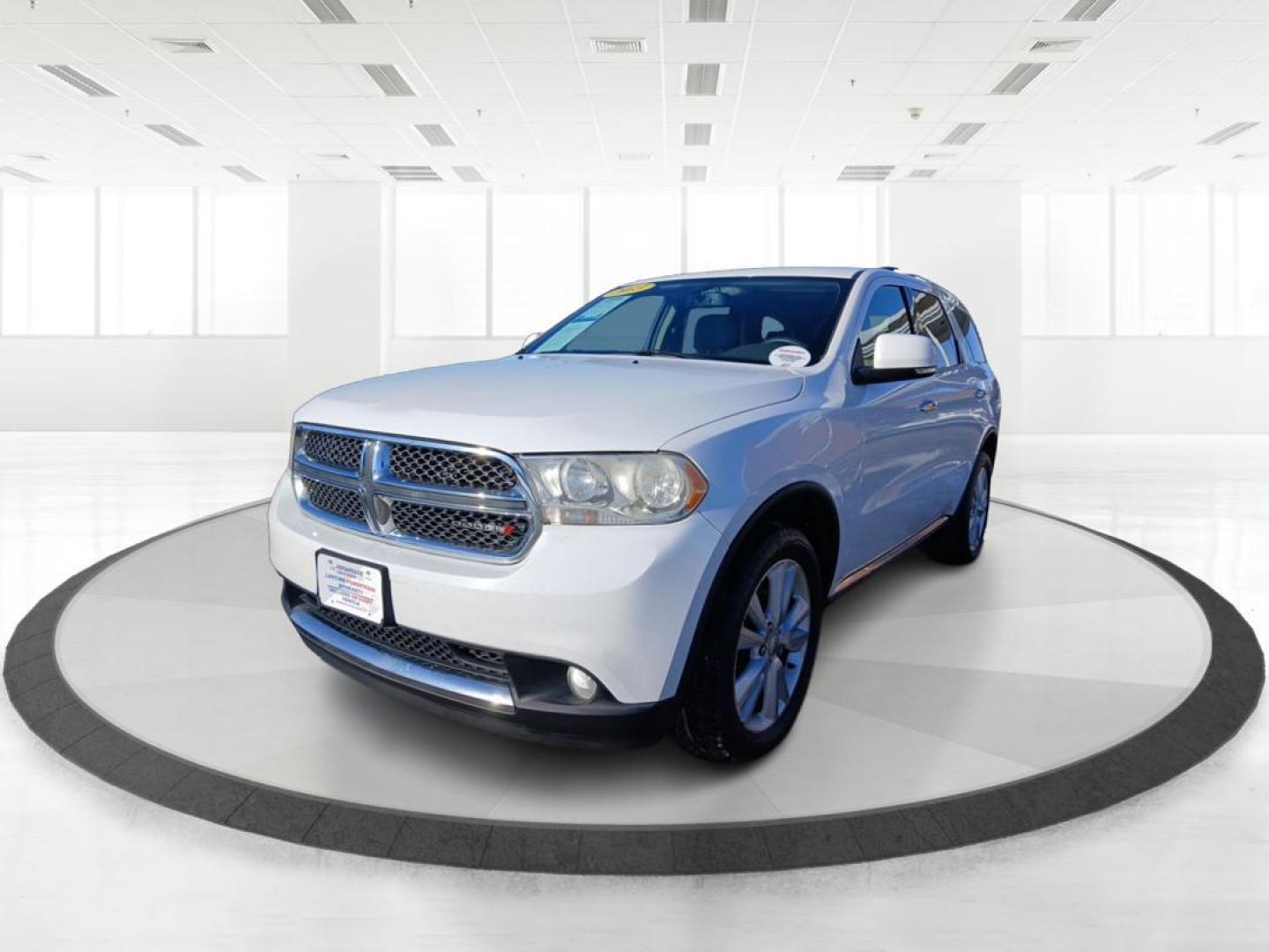 2013 Dodge Durango Limited (1C4RDJDG1DC) with an Other engine, Automatic transmission, located at 1099 N County Rd 25A, Troy, OH, 45373, (937) 908-9800, 40.057079, -84.212883 - Third Row - Photo#7