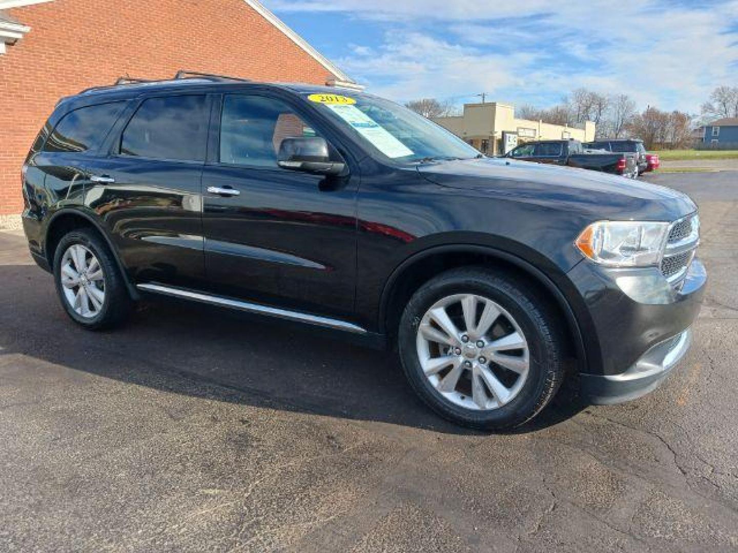 2013 Brilliant Black Crystal Pearl Dodge Durango Crew AWD (1C4RDJDG9DC) with an 3.6L V6 DOHC 24V engine, 5-Speed Automatic transmission, located at 1230 East Main St, Xenia, OH, 45385, (937) 908-9800, 39.687321, -83.910294 - Photo#0