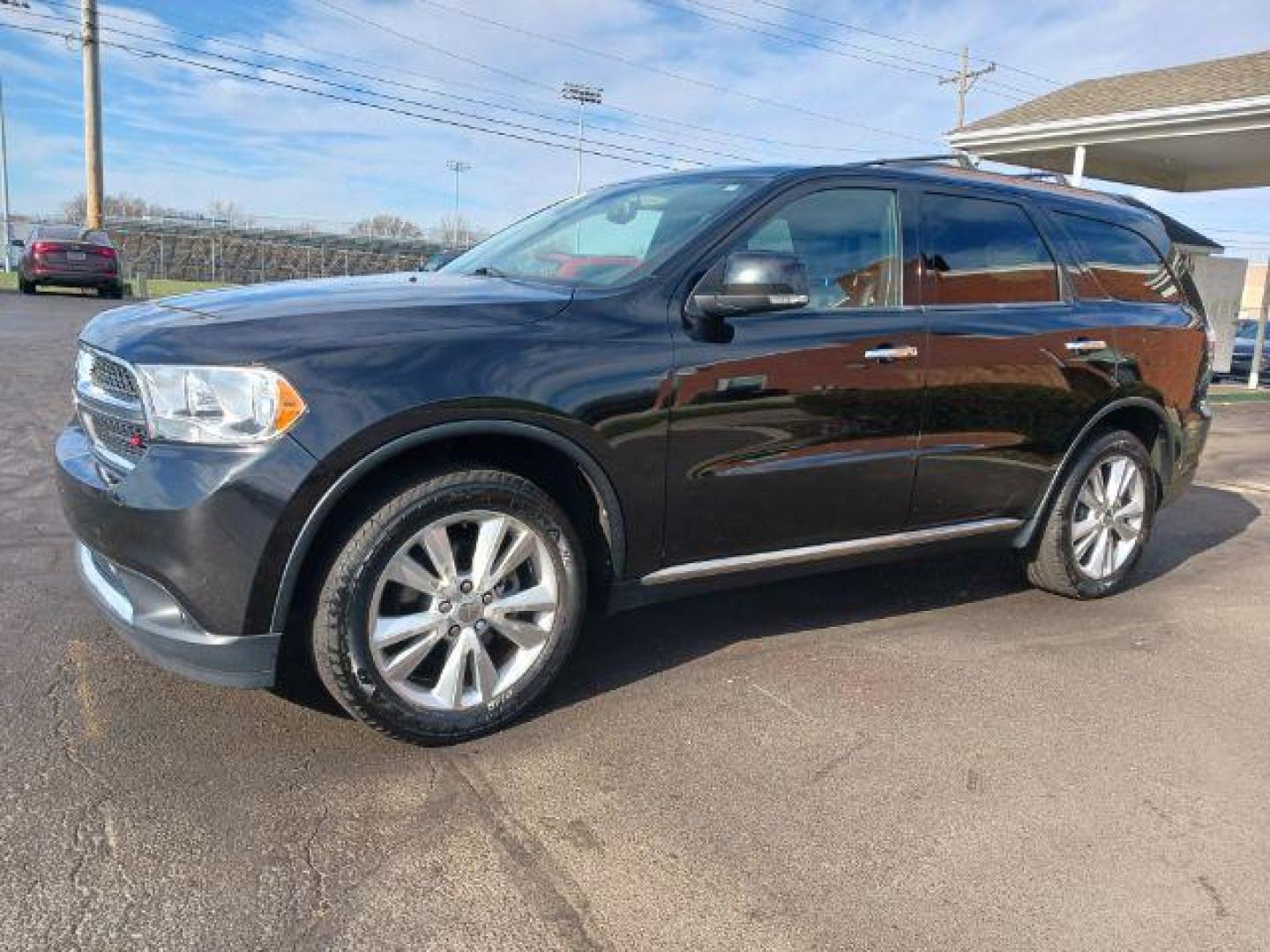 2013 Brilliant Black Crystal Pearl Dodge Durango Crew AWD (1C4RDJDG9DC) with an 3.6L V6 DOHC 24V engine, 5-Speed Automatic transmission, located at 1230 East Main St, Xenia, OH, 45385, (937) 908-9800, 39.687321, -83.910294 - Photo#2